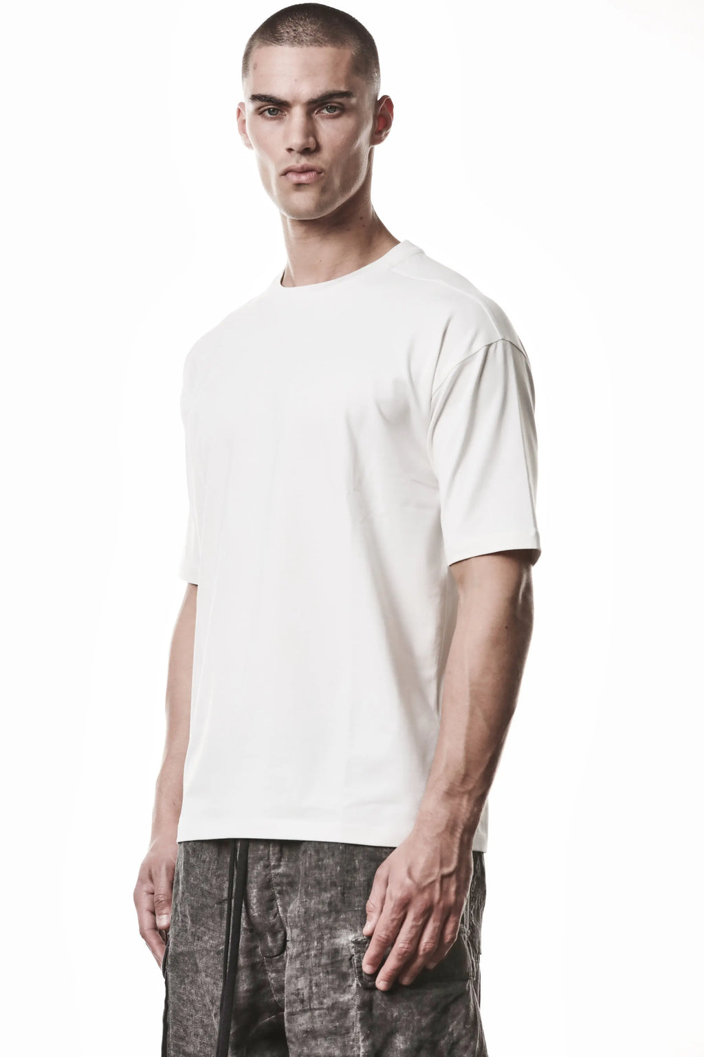 Thom Krom T-Shirt,Mens T-Shirt,Round Crewneck,Relaxed Fit,Soft Cotton Modal Jersey In Off White,Side Angle Upper Body Photo