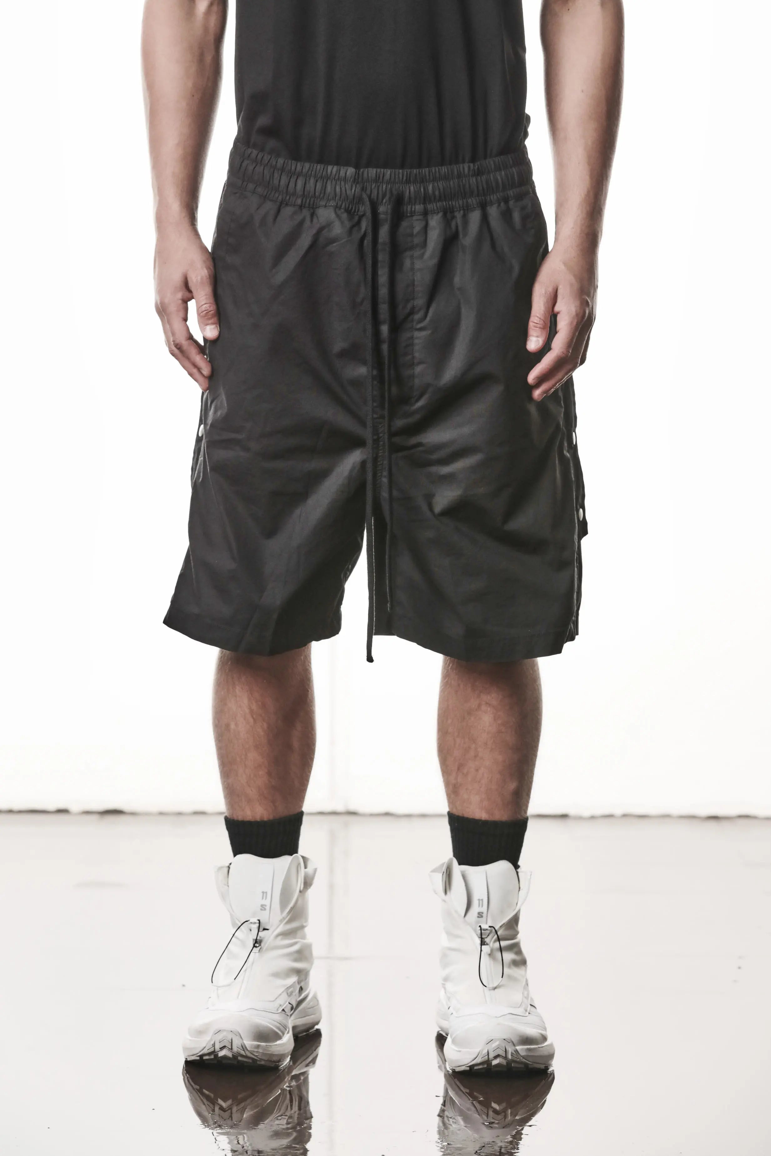 Thom Krom, Mens Shorts, Black, Over the Knee, Elasticated Waistband, Black Drawstring, Cargo Pockets, Side Pockets, Wide-fit, Drop-crotch, Front View. 