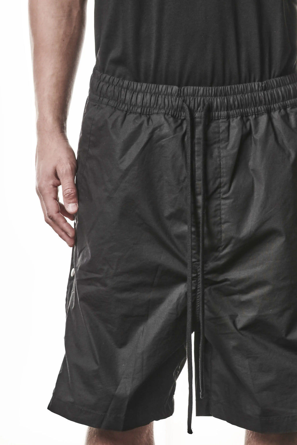 Thom Krom, Mens Shorts, Black, Over the Knee, Elasticated Waistband, Black Drawstring, Cargo Pockets, Side Pockets, Wide-fit, Drop-crotch, Fit Close-up Front View. 