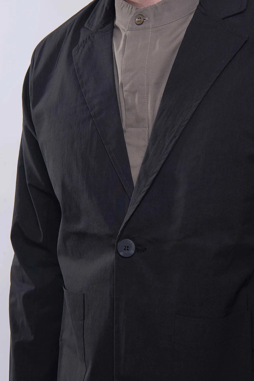 Thom Krom, Mens Blazer, Black, Button-Closure, V-Neck, Long Sleeves, Cotton, Polyamide, Elastane/Spandex, Bellows Pockets, Close-up Front 3/4 View. 