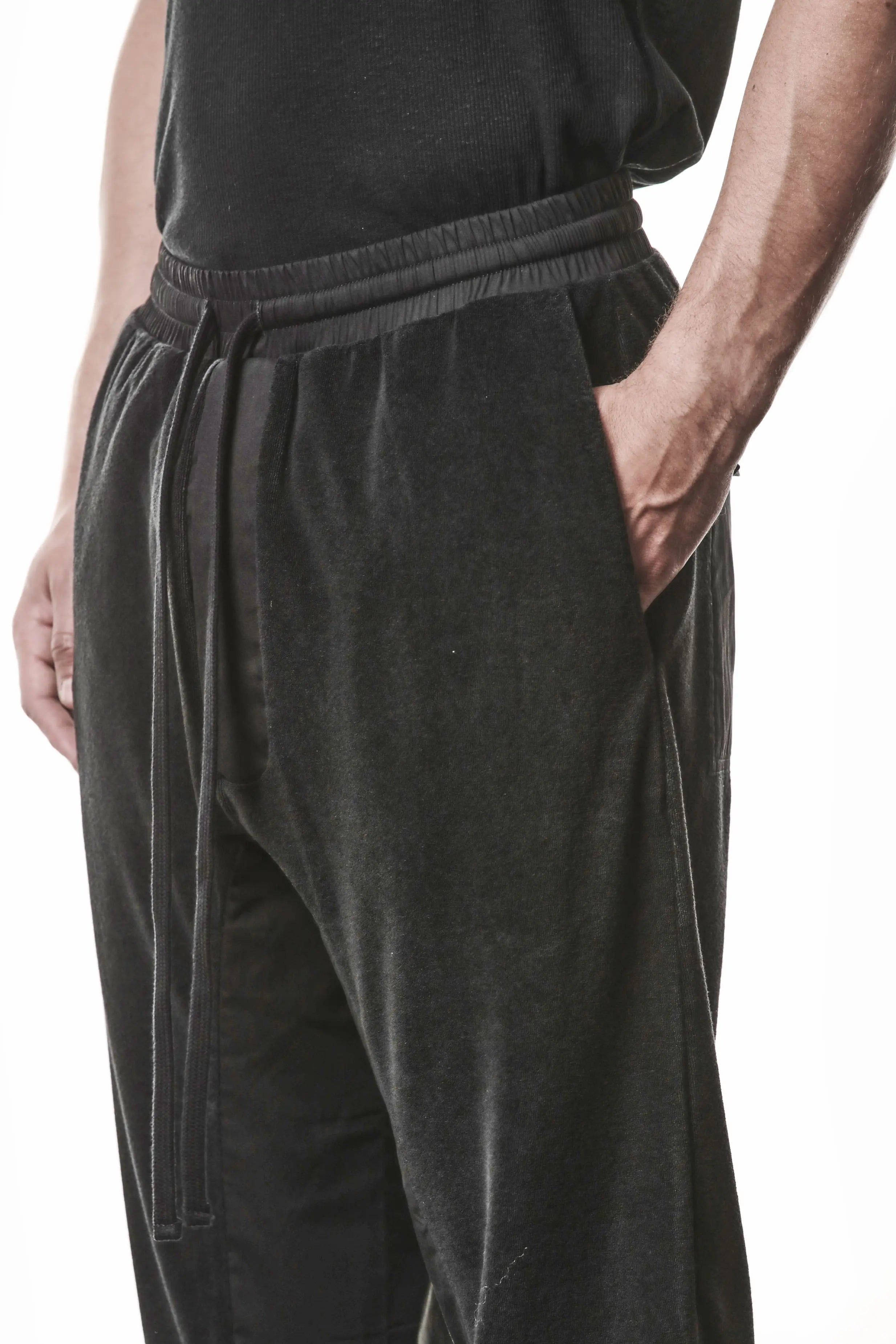 Thom Krom, Mens Pants, Black, Cotton Terry, Elasticated Waistband, Drawstring, Inserts, Side Pockets, Back Pockets, Ribbed Cuffs, The night is your friend, my love, Front 3/4 View Close-up. 