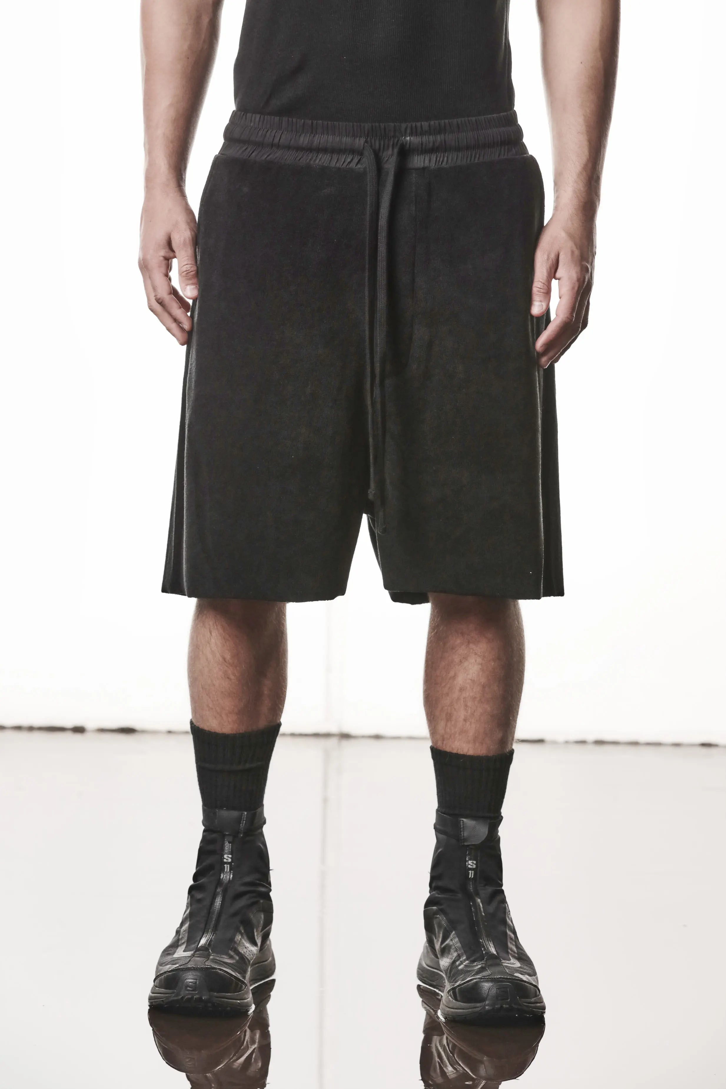 Thom Krom, Mens Shorts, Black, Elasticated Waistband, Drawstring, Raw cut hem and slits, Cotton Terry, Woven Inserts, 1/2 Legs, Side Pockets, Front Portrait. 