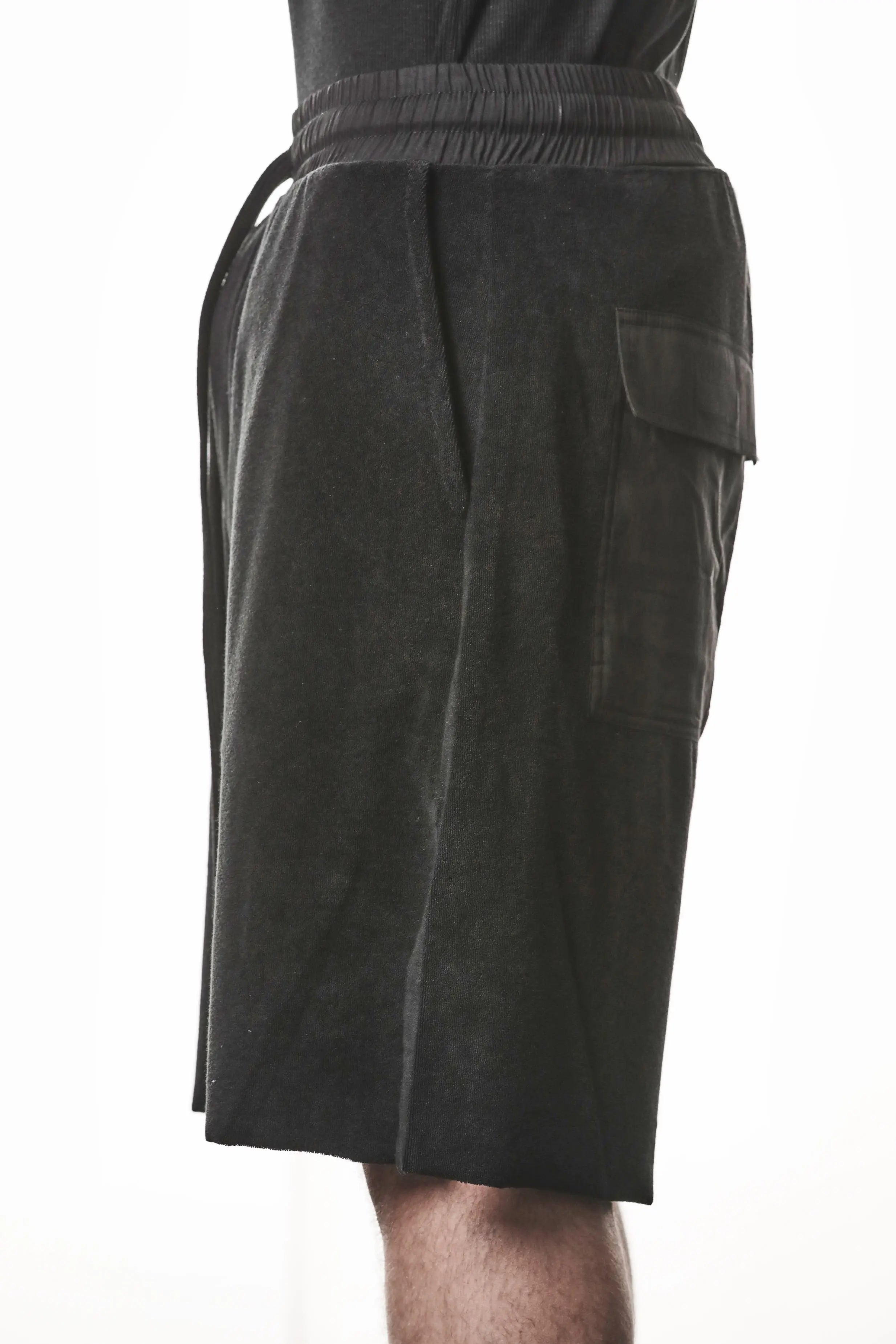 Thom Krom, Mens Shorts, Black, Elasticated Waistband, Drawstring, Raw cut hem and slits, Cotton Terry, Woven Inserts, 1/2 Legs, Side Pockets, Side View. 