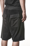 Thom Krom, Mens Shorts, Black, Elasticated Waistband, Drawstring, Raw cut hem and slits, Cotton Terry, Woven Inserts, 1/2 Legs, Side Pockets, Back Pockets 3/4 View Close-up. 