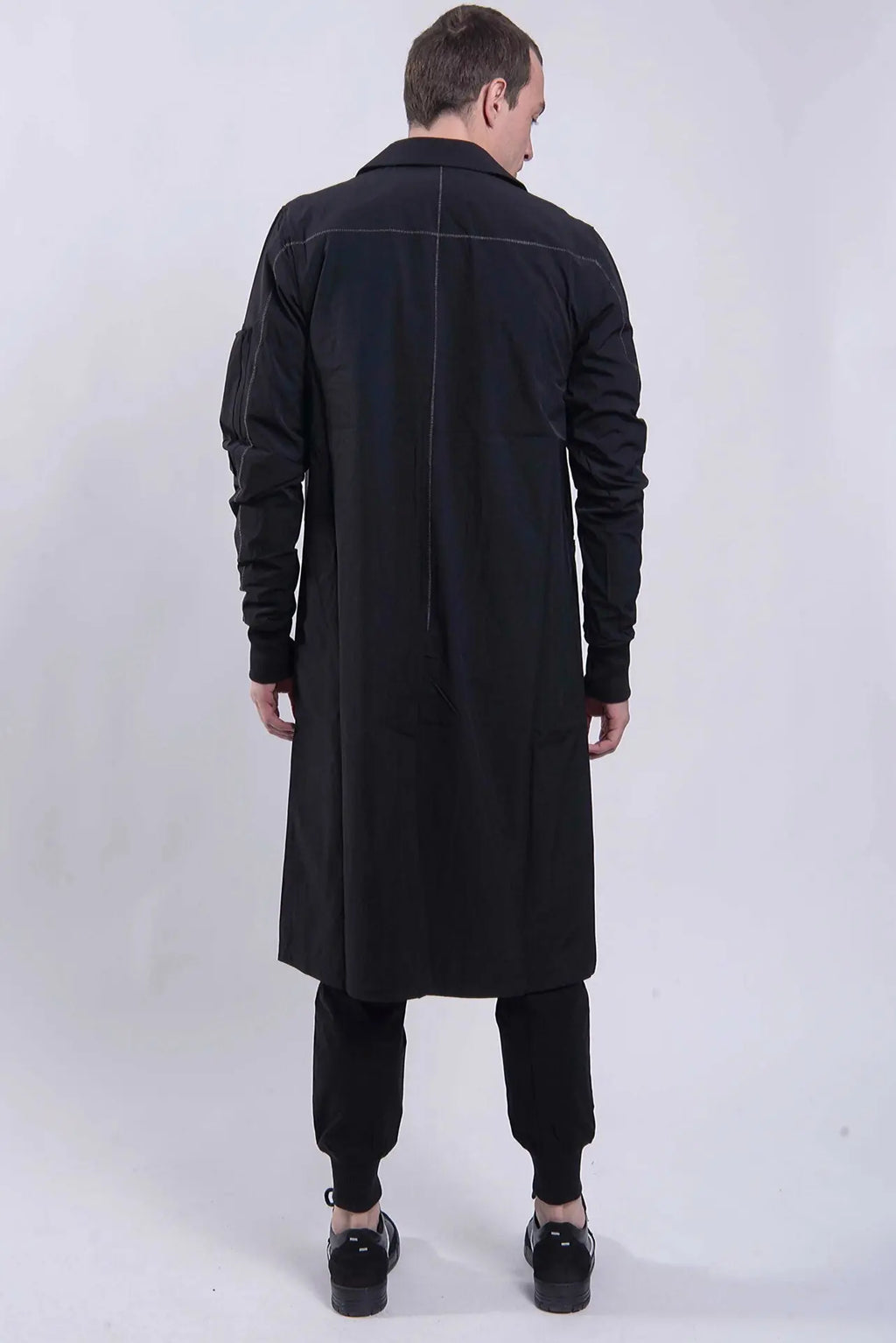 Thom Krom, Mens Coat, Black, Two-Button Closure, Sleeve Pocket, V-Neck, Bellows Pockets, Ribbed Cuffs, YKK Zipper, Full Body Back View. 