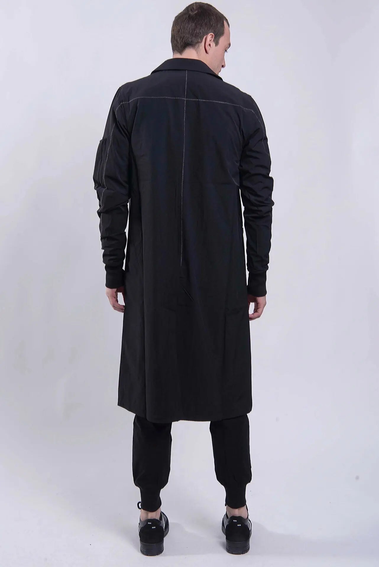 Thom Krom, Mens Coat, Black, Two-Button Closure, Sleeve Pocket, V-Neck, Bellows Pockets, Ribbed Cuffs, YKK Zipper, Full Body Back View. 