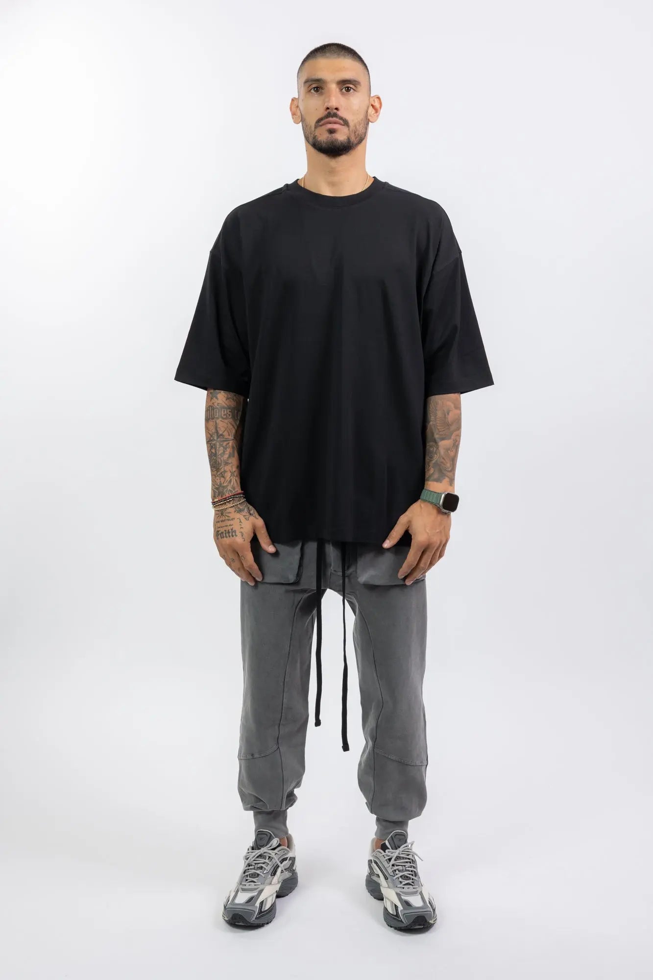 Thom Krom,Mens T-Shirt,Black,Oversized Fit,Round Crewneck,Embroidered Logo On The Back,Print At Backside,Straight Hemline,Folded Hems,Soft Strong Modal Jersey,Front View.