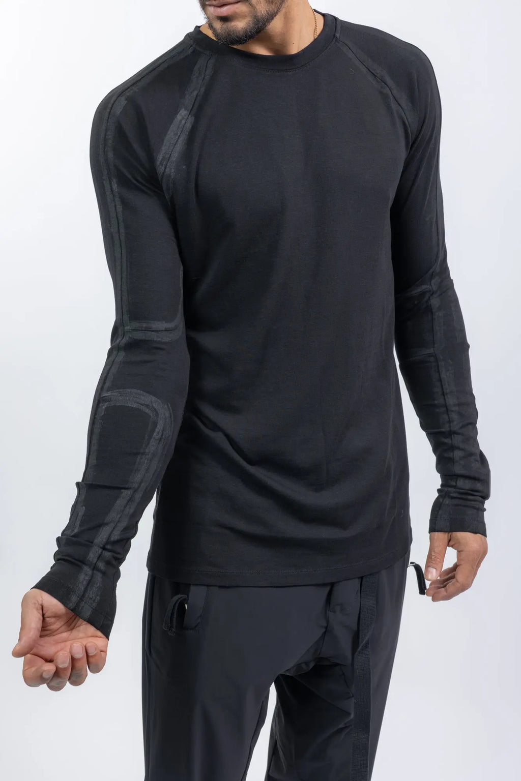 Thom Krom,Mens Longsleeve,Black,Handpainted,Regular Fit,Ribbed Round Crewneck,Long Ranglan Sleeves,Tonal Handpainted Details On Shoulders Back And Sleeves,Straight Hem,Distinctive Long Center Seam Running Down The Back, Detailed Photo Of The Sleeve.