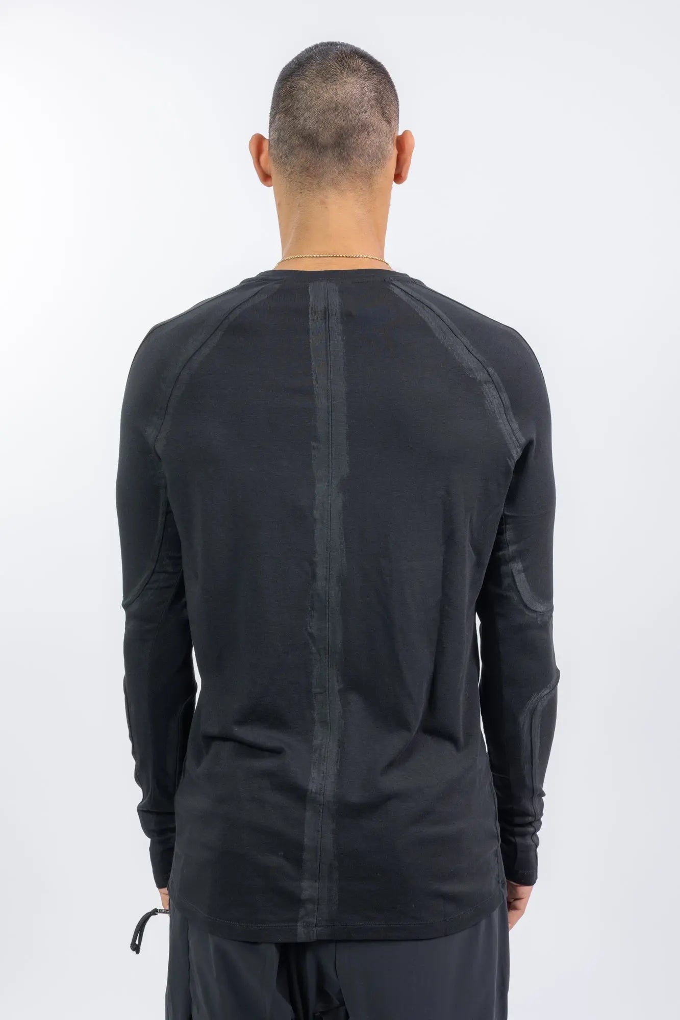 Thom Krom,Mens Longsleeve,Black,Handpainted,Regular Fit,Ribbed Round Crewneck,Long Ranglan Sleeves,Tonal Handpainted Details On Shoulders Back And Sleeves,Straight Hem,Distinctive Long Center Seam Running Down The Back, Back View.