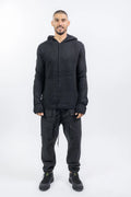 Thom Krom,Mens Trousers,Relaxed Fit,Mid-Rise Waist,Drop Crotch,Tapered Leg,Elastic Waistband With Adjustable Drawstring,Concealed Button Placket With Logo Buttons At The Front,Two Patch Bellows Pockets With Zipper On The Front,Two Patch Bellow pockets With Flaps On The Front,Welt Pocket 
And Patch Bellows Pocket With Flap On The Back,Security Pocket With Zipper On The Inside,Leg Hem With Elastic Insert On The Back, Front View.