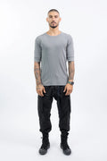Thom Krom,Mens T-Shirt,Used Grey,Raw Cut Hems,Round  Distressed Crewneck,Straight Hemline,Back Center Seam Detail,Embroidered Logo On The Back,Long Sleeve Cut Detail,Front View.