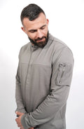 Thom Krom, Mens Shirt, Anthracite Grey, Long Sleeves, Hidden Placket, Sleeve Zip Pocket, Stand up Collar, Exposed Seams, Close-up Front 3/4 Portrait View. 