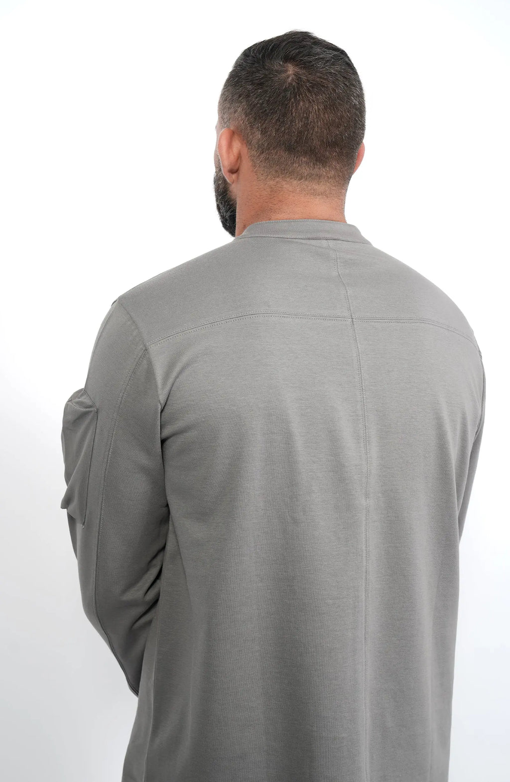 Thom Krom, Mens Shirt, Anthracite Grey, Long Sleeves, Hidden Placket, Sleeve Zip Pocket, Stand up Collar, Exposed Seams, Back 3/4 View. 
