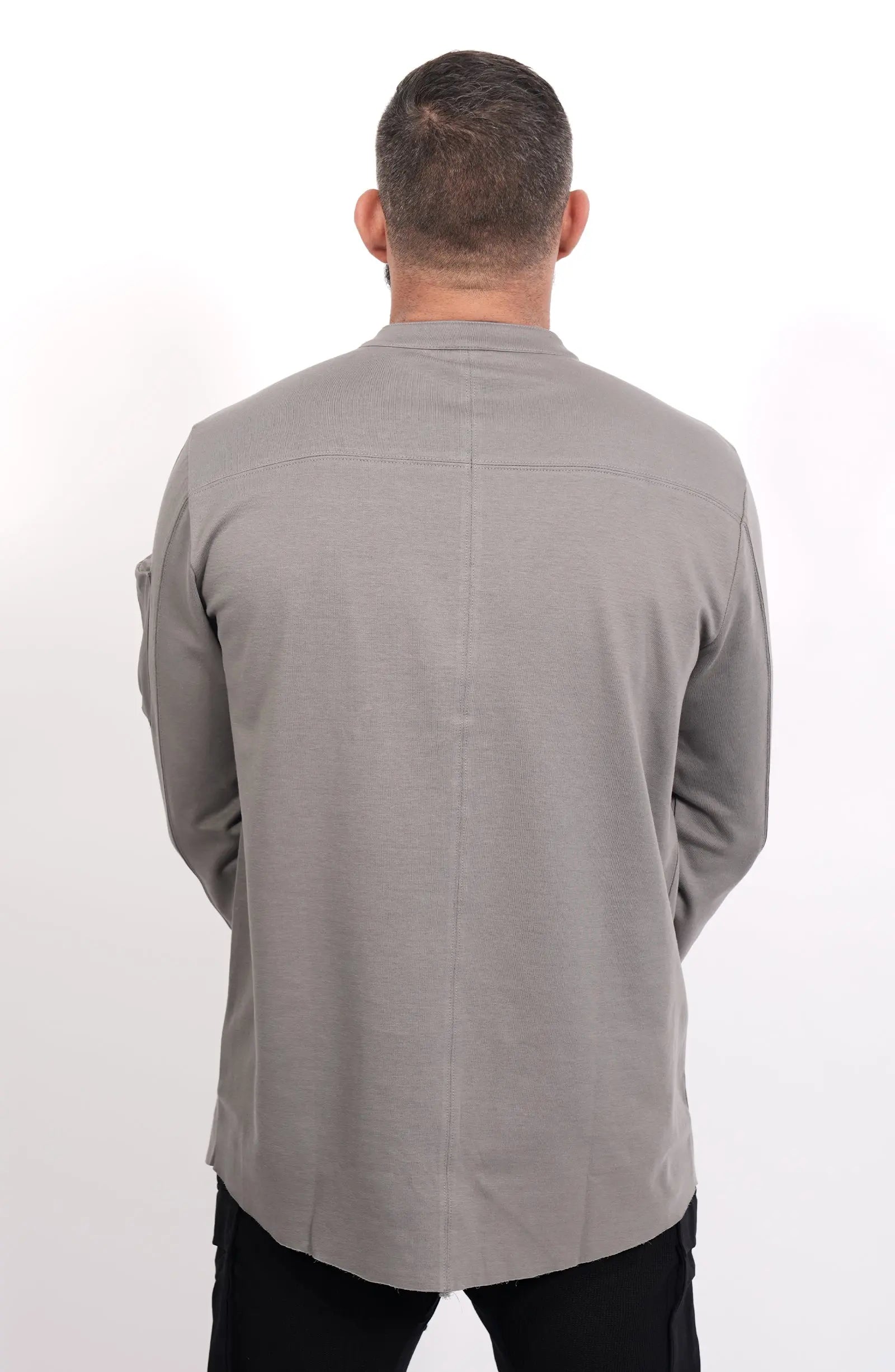 Thom Krom, Mens Shirt, Anthracite Grey, Long Sleeves, Hidden Placket, Sleeve Zip Pocket, Stand up Collar, Exposed Seams, Back Portrait. 