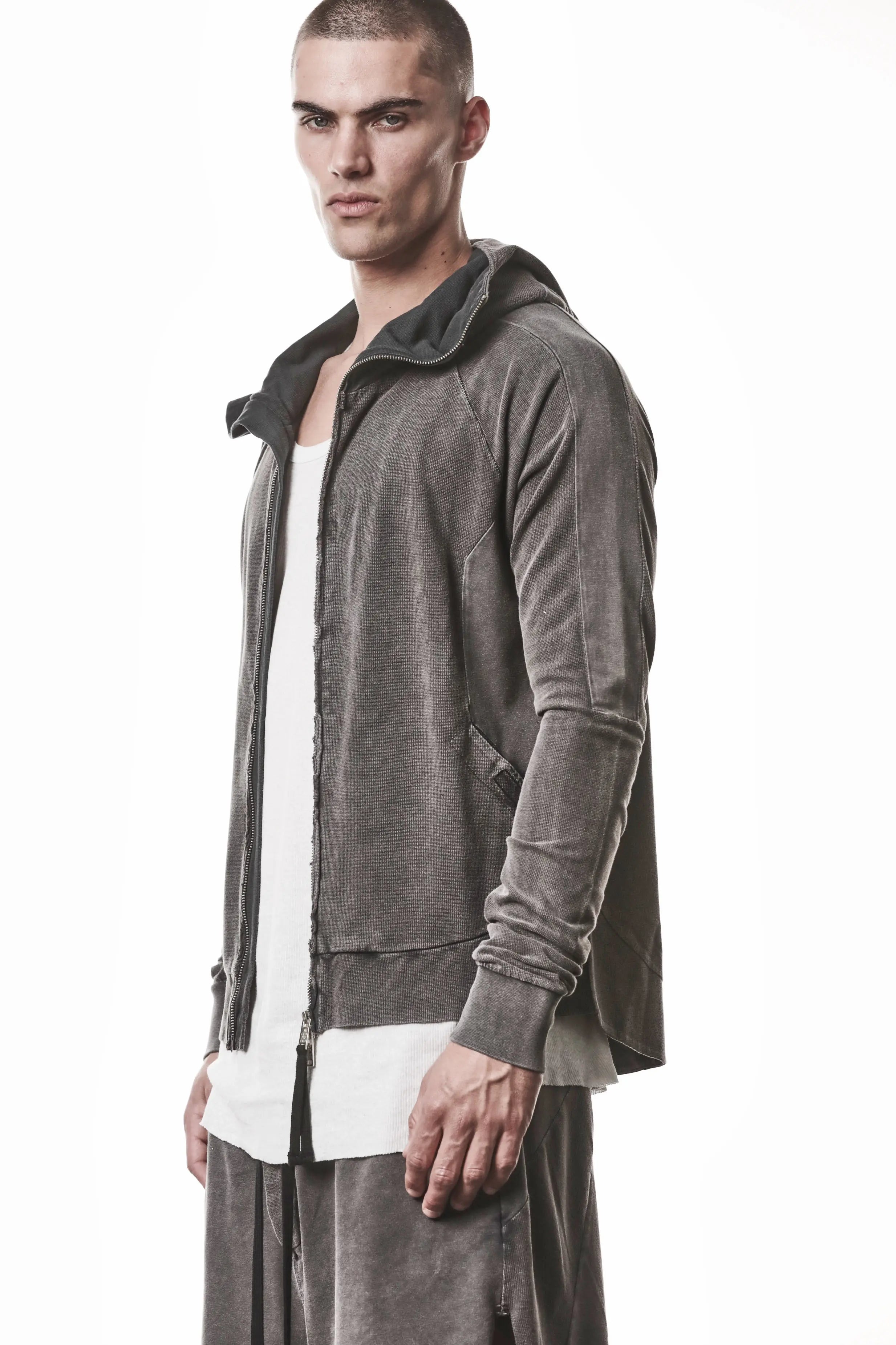 Thom Krom, Mens Jacket, Dark Used Grey, Two-way Zip, Full-zip, Ykk Zipper, Side Pockets, Long Sleeves, Hood, Ribbed Hem and Cuffs, Hidden Pockets, Front 3/4 Portrait View Unzipped. 