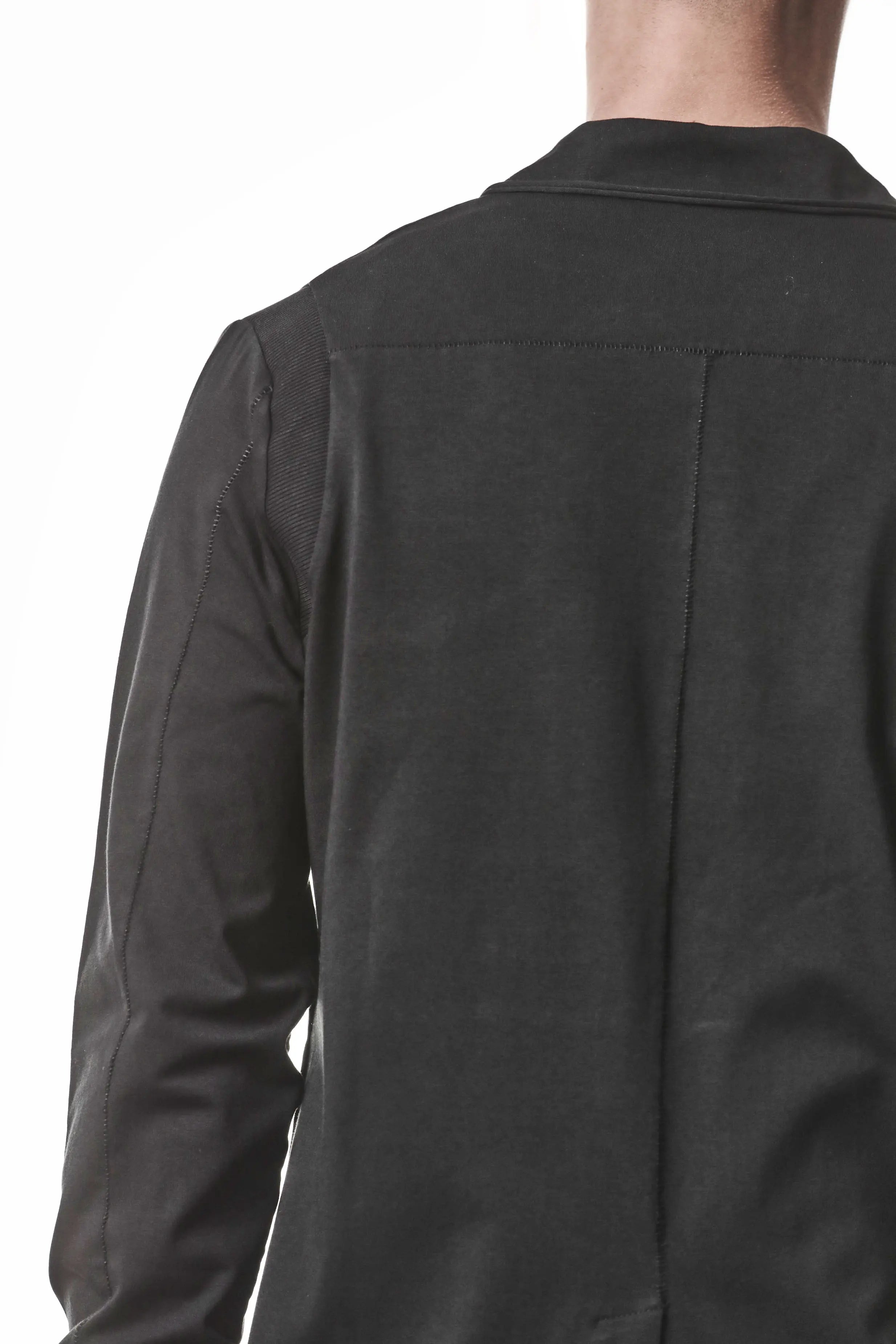 Thom Krom, Mens Blazer, Black, Shoulder Rib Patch, Thumbholes, 100% Cotton, Spandex, One Button, Thom Krom Button, Bellows Pockets, Long Sleeves, Regular Fit, Back View Shoulder Inserts Showcase. 