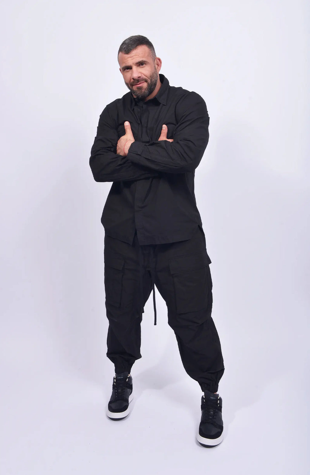 Thom Krom, Mens Shirt, Black, Patched Pocket, Back Details, Collar, Hidden Placket, Long Sleeves, Cotton, Elastane, Stretch, Washed Cotton, Full Body Front View Crossed Hands. 