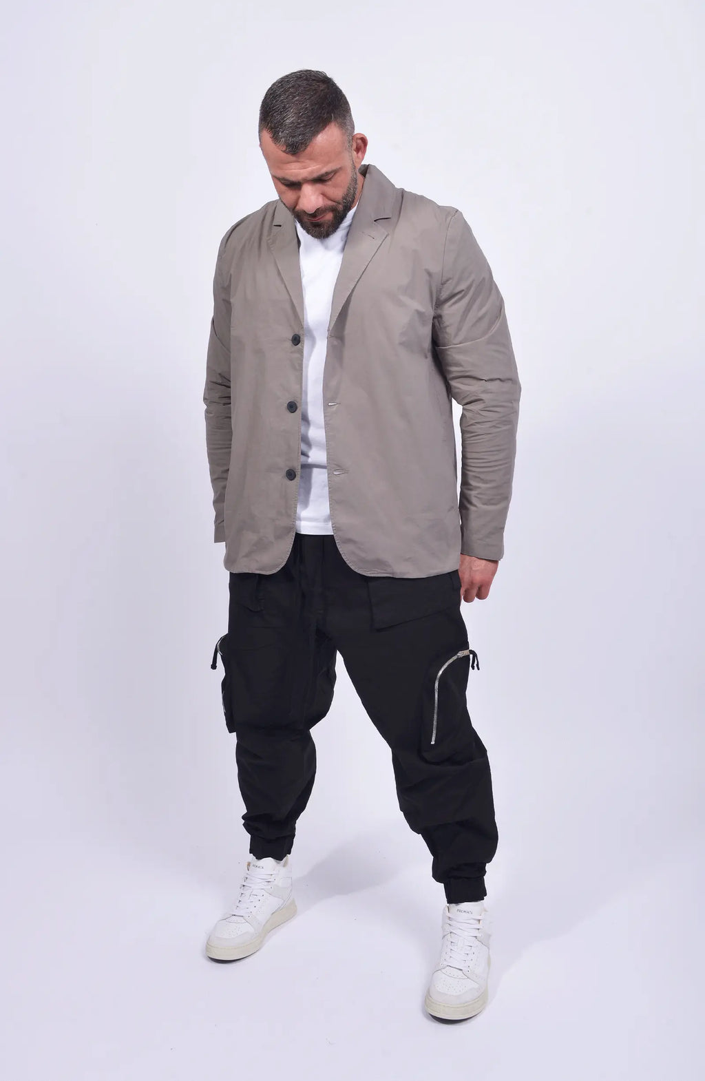 Thom Krom, Mens Blazer, Rock, Long Sleeves, Stand Up Collar, V-Neck, Three-Button Closure, White T-Shirt, Mid Length, Side Pockets, Full Body Front 3/4 View Looking Down. 