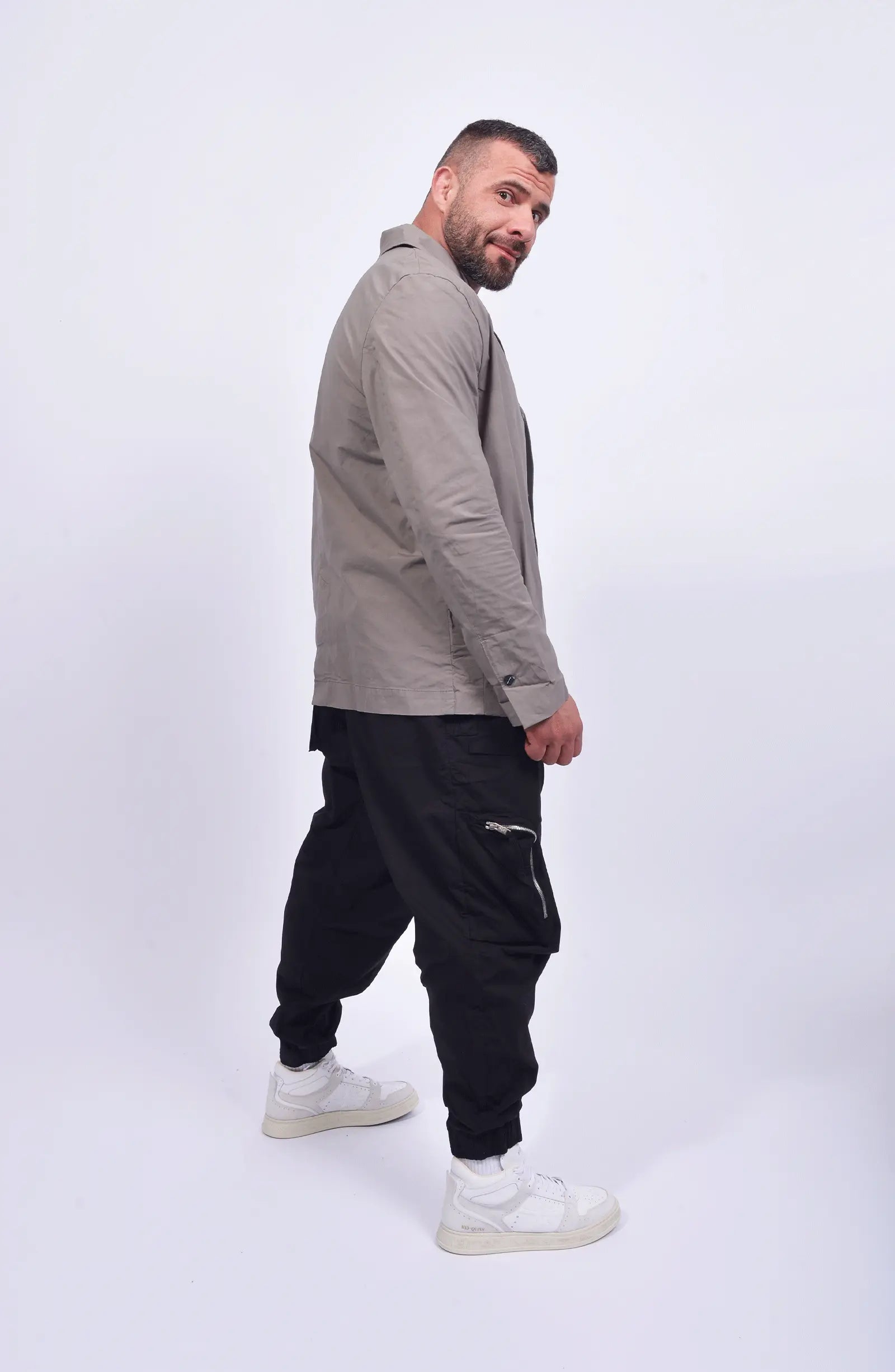 Thom Krom, Mens Blazer, Rock, Long Sleeves, Stand Up Collar, V-Neck, Three-Button Closure, White T-Shirt, Mid Length, Side Pockets, Side View. 