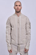 Thom Krom, Mens Jacket, Sand Shell, Ivory, Beige, Contrast Details, Thumbholes, Full-zip, YKK Zippers, Side Pockets, Sleeve Zip Pocket, Thom Krom Snap, White Detailing, Front portrait.
