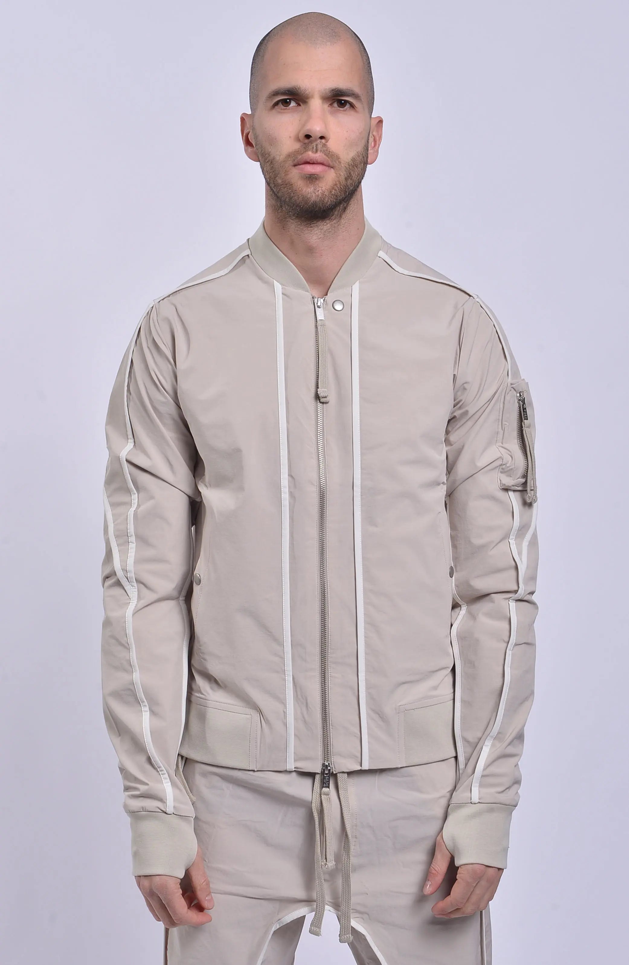 Thom Krom, Mens Jacket, Sand Shell, Ivory, Beige, Contrast Details, Thumbholes, Full-zip, YKK Zippers, Side Pockets, Sleeve Zip Pocket, Thom Krom Snap, White Detailing, Front portrait.