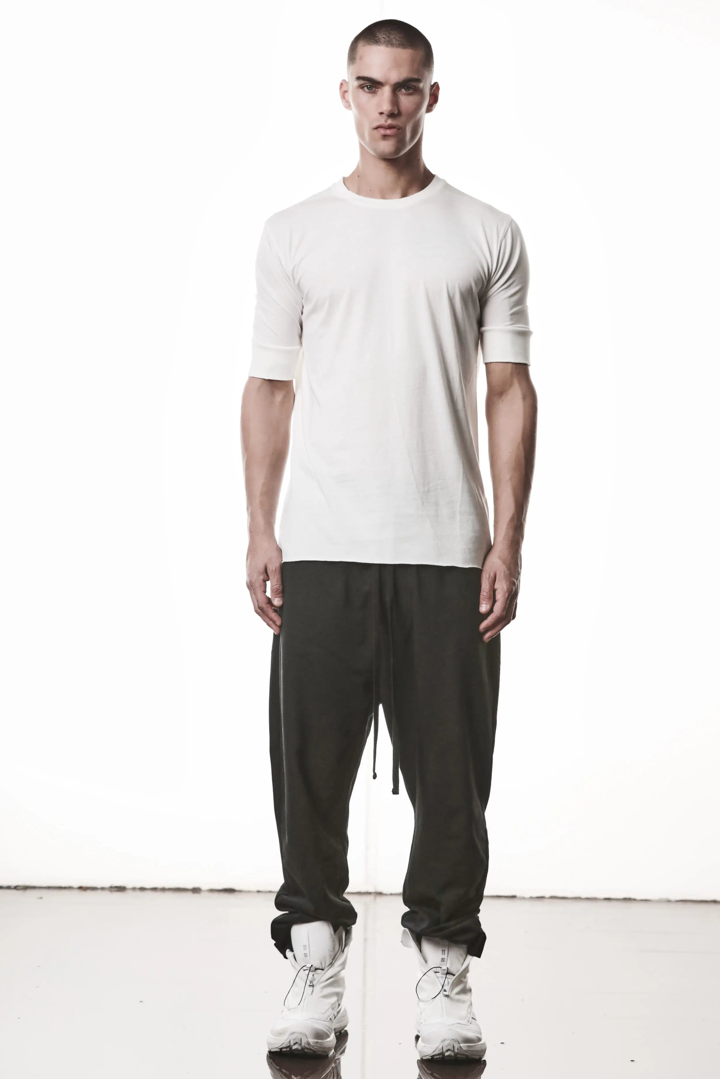 Thom Krom, Mens T-Shirt, Off-White, Cotton Modal Jersey, Ribbed Cuffs, Short Sleeves, Round Neck, Slim fit, Full Body Photo. 