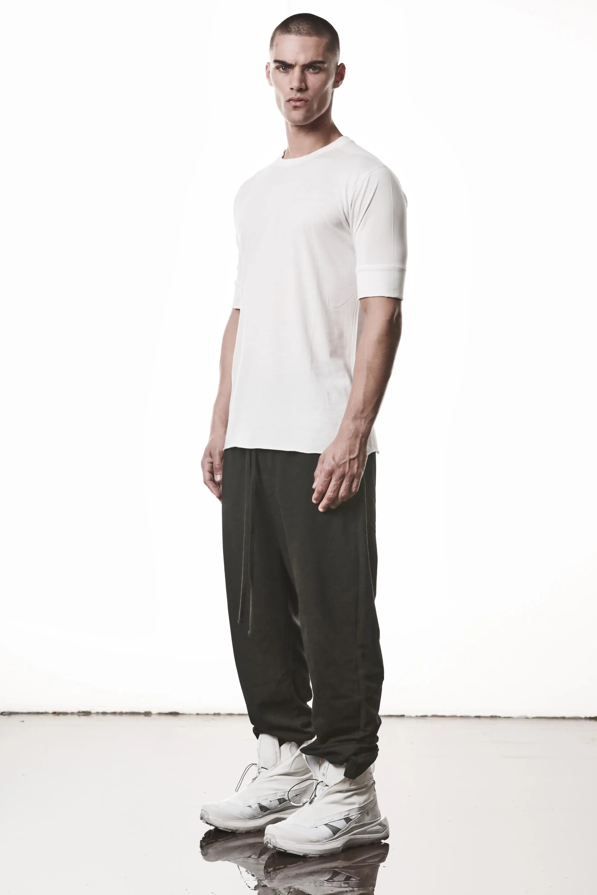 Thom Krom, Mens T-Shirt, Off-White, Cotton Modal Jersey, Ribbed Cuffs, Short Sleeves, Round Neck, Slim fit, Full Body 3/4 Photo. 