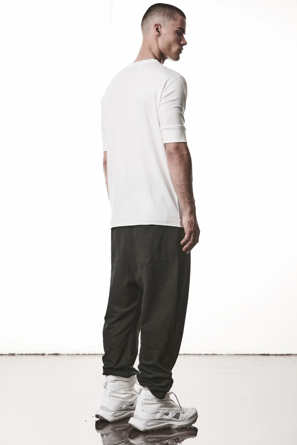 Thom Krom, Mens T-Shirt, Off-White, Cotton Modal Jersey, Ribbed Cuffs, Short Sleeves, Round Neck, Slim fit, Full Body 3/4 Back View. 