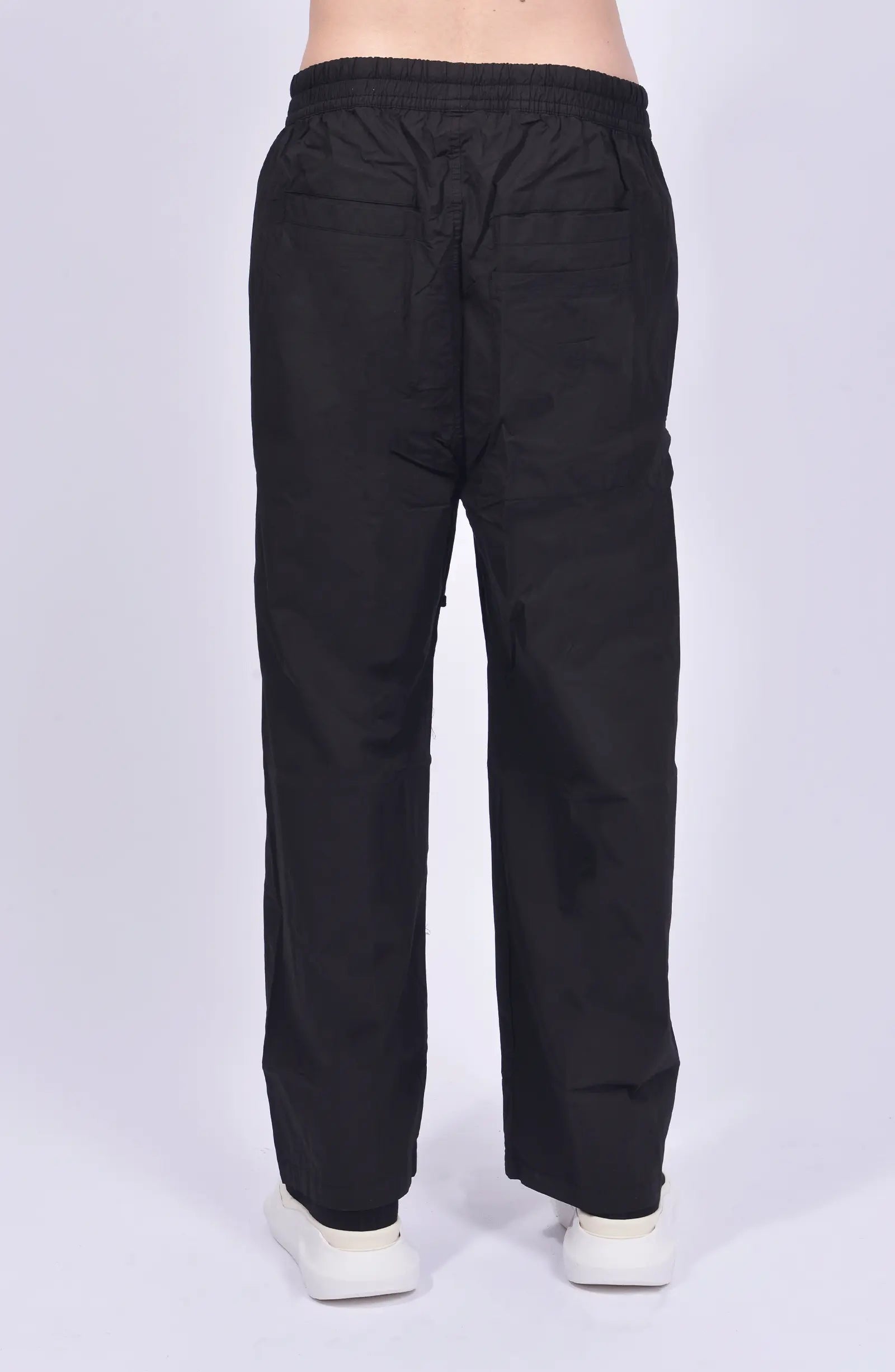 Thom Krom, Mens Pants, Black, Wide Fit, Oversized Trousers, Elasticated Waistband, Drawstring, Side Pockets, Straight Legs, Back Pockets, Back View. 