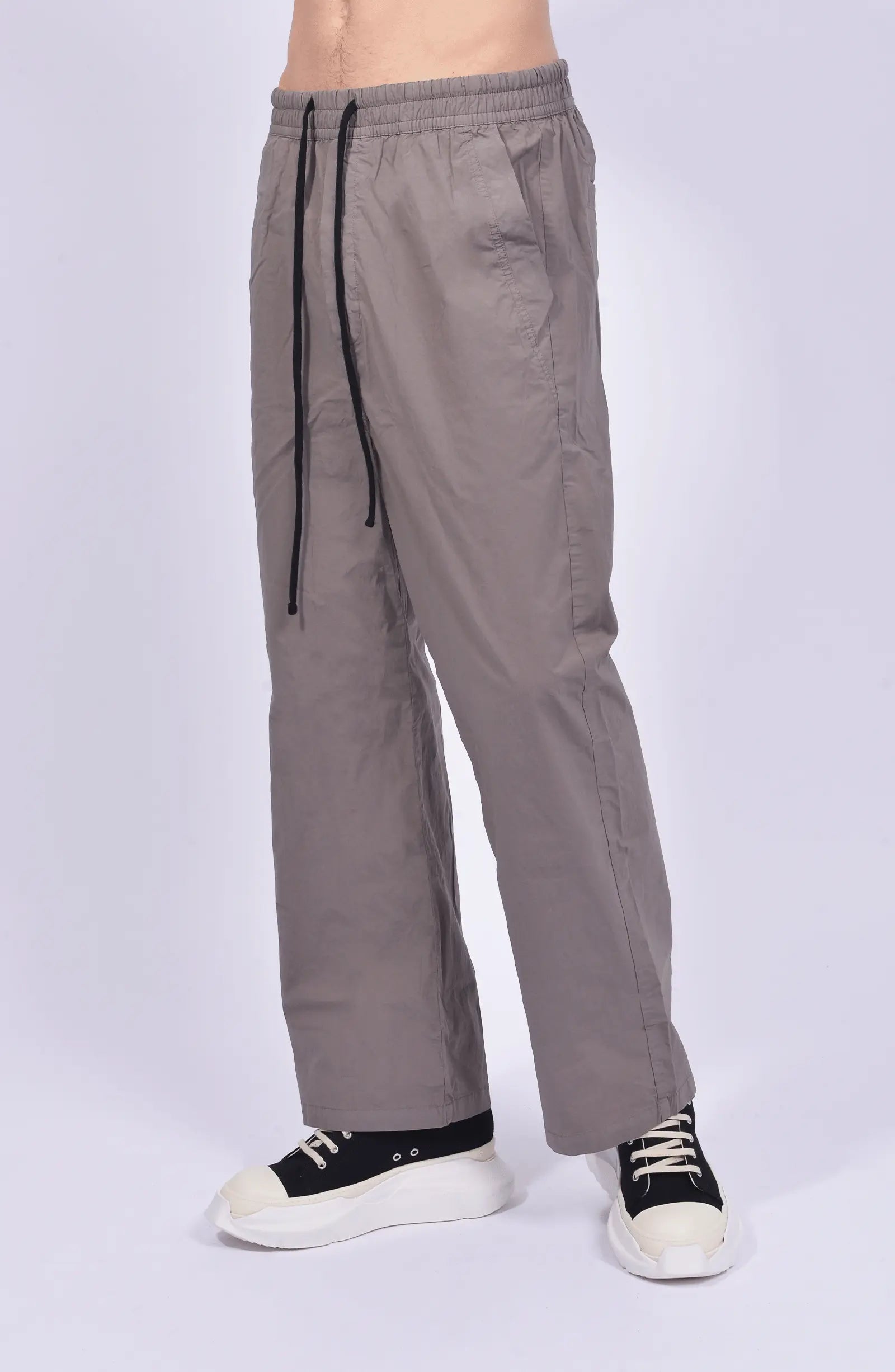Thom Krom, Mens Pants, Rock, Wide Fit, Oversized Trousers, Elasticated Waistband, Drawstring, Side Pockets, Straight Legs, Back Pockets, Front 3/4 View. 