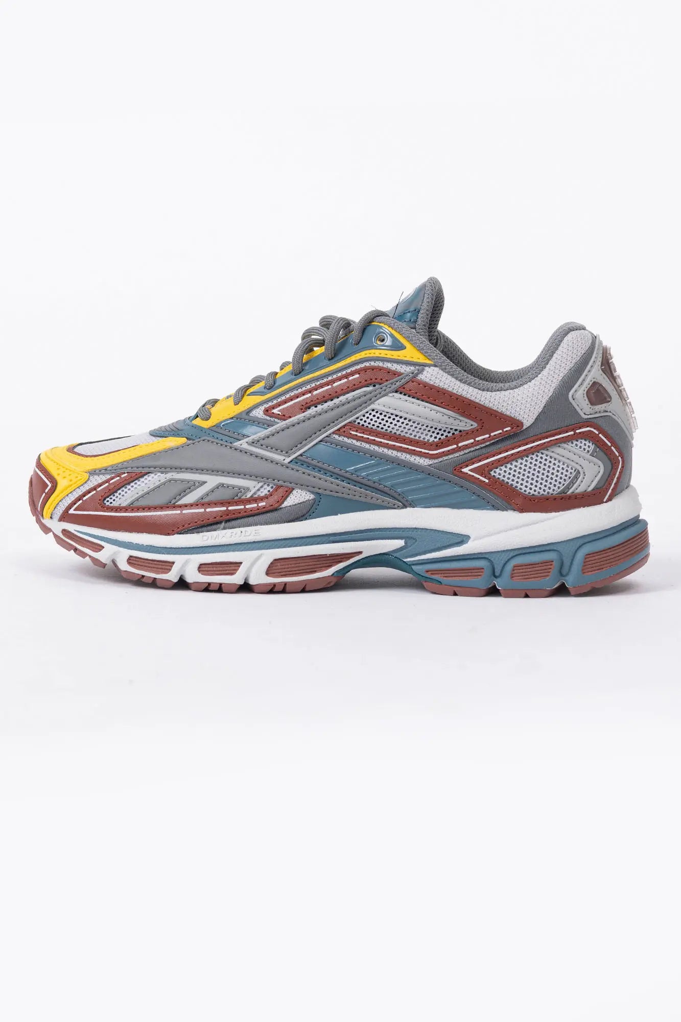 Reebok, Mens Sneakers, Black, dual-density midsole with DMX cushioning technology, TPU midfoot Shank for Support, Rubber Outsole, Breathable Mesh, Leather Overlays, Tricolor Modern Technical Style Sneaker, Side View. 