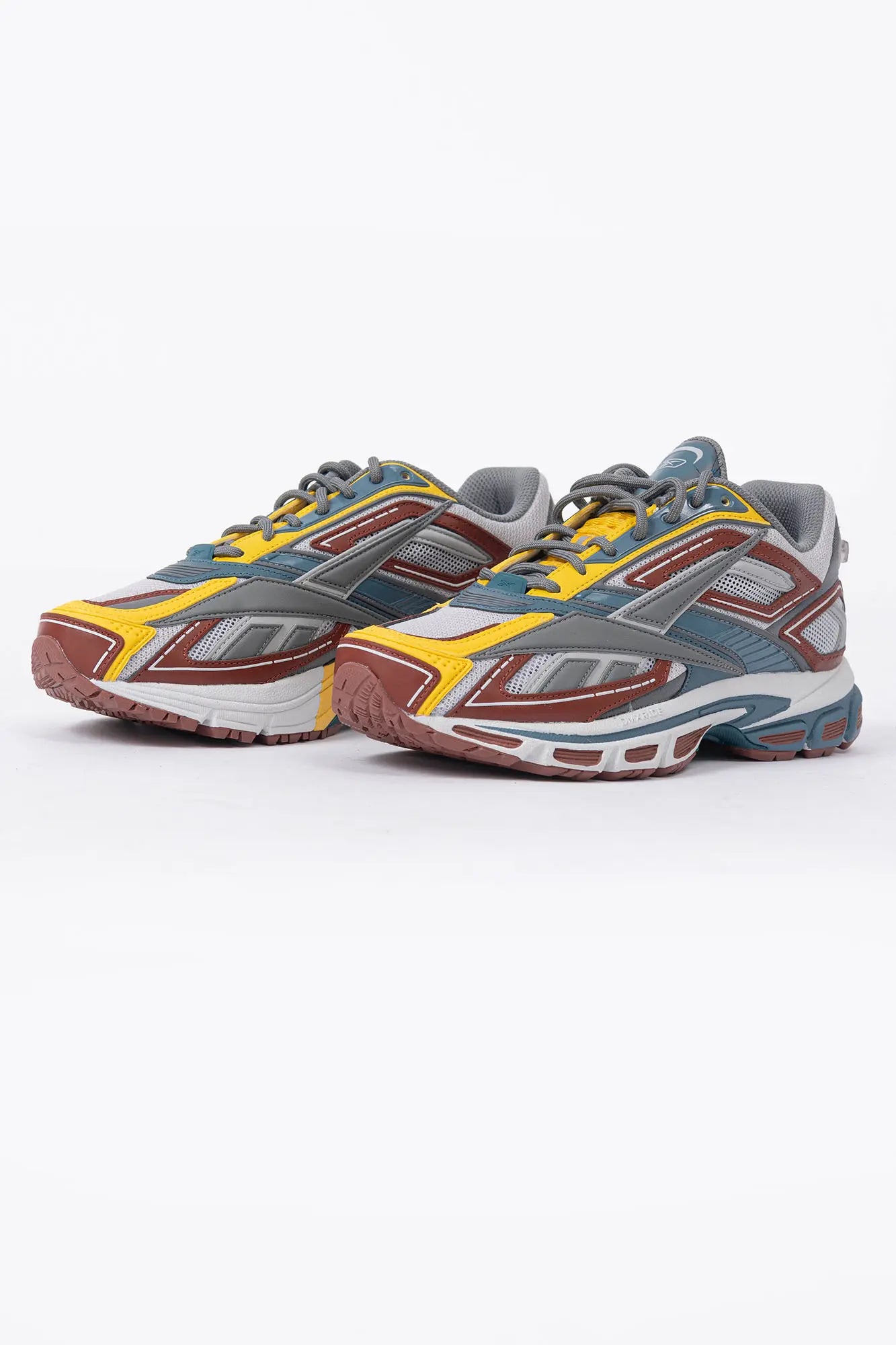 Reebok, Mens Sneakers, Black, dual-density midsole with DMX cushioning technology, TPU midfoot Shank for Support, Rubber Outsole, Breathable Mesh, Leather Overlays, Tricolor Modern Technical Style Sneaker, Front 3/4 View. 