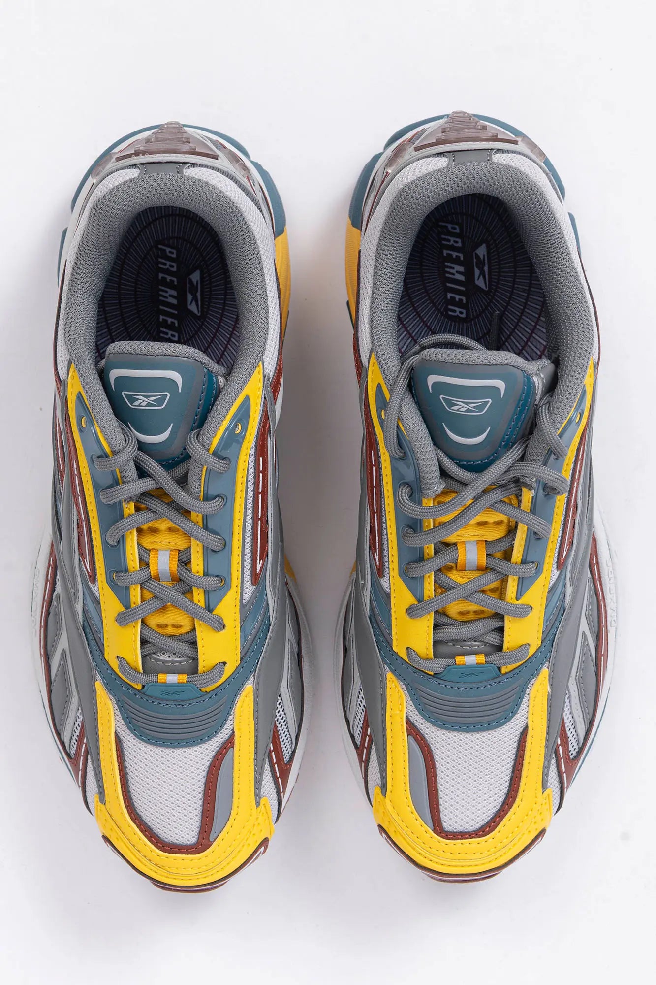 Reebok, Mens Sneakers, Black, dual-density midsole with DMX cushioning technology, TPU midfoot Shank for Support, Rubber Outsole, Breathable Mesh, Leather Overlays, Tricolor Modern Technical Style Sneaker, Top-Down View. 