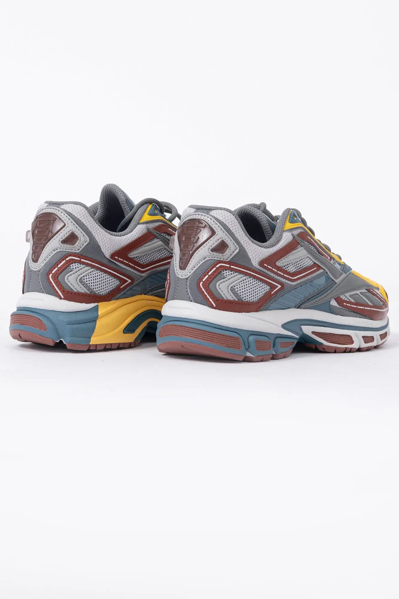 Reebok, Mens Sneakers, Black, dual-density midsole with DMX cushioning technology, TPU midfoot Shank for Support, Rubber Outsole, Breathable Mesh, Leather Overlays, Tricolor Modern Technical Style Sneaker, Back 3/4 View. 