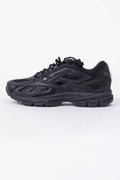 Reebok, Mens Sneakers, Black, dual-density midsole with DMX cushioning technology, TPU midfoot Shank for Support, Rubber Outsole, Breathable Mesh, Leather Overlays, All Black Modern Technical Style Sneaker, Side View. 