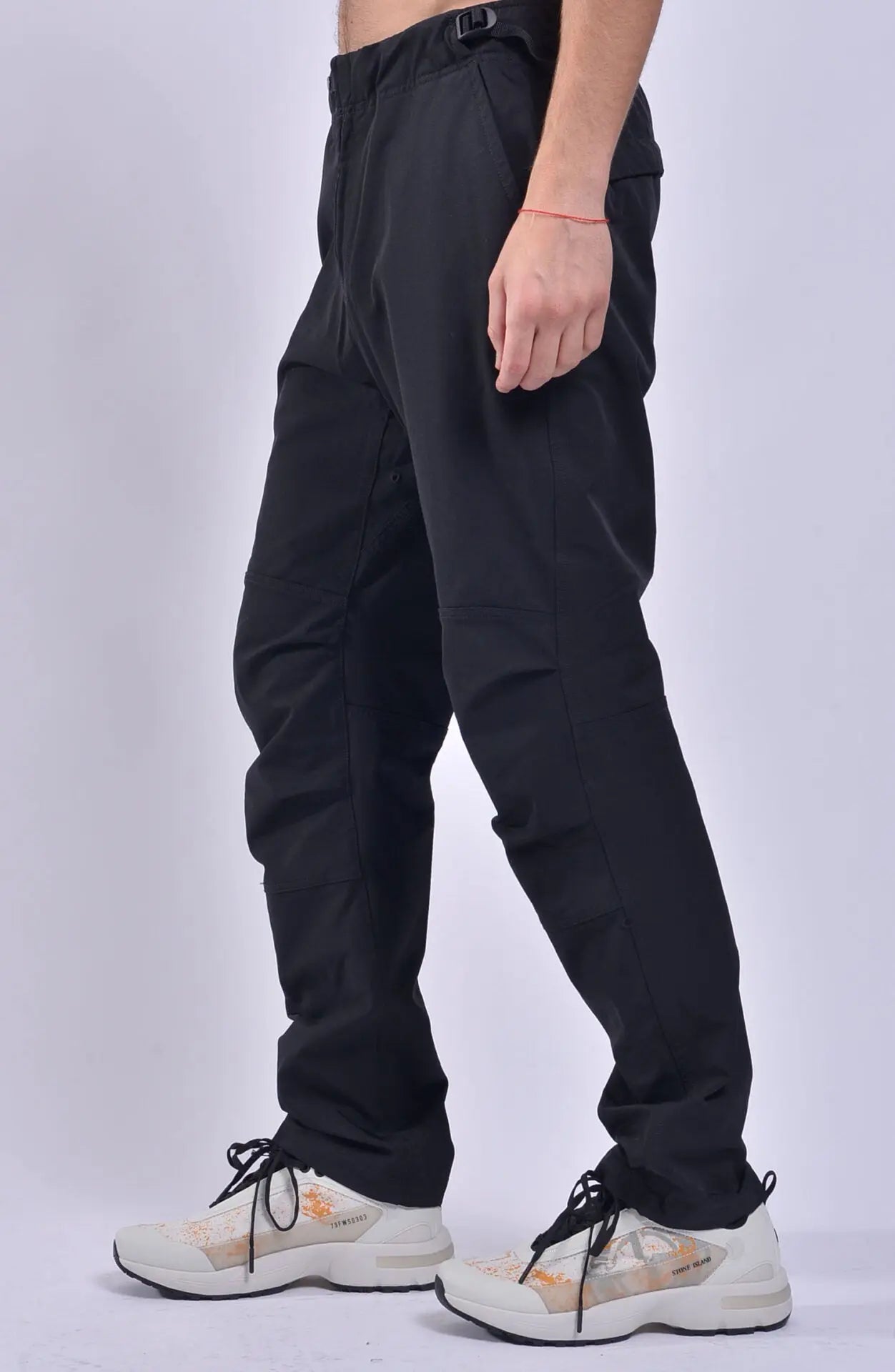 Stone Island, Mens Pants, Chino Trousers, Black, V0029, Stone Island Snaps, Pockets, YKK Zippers, Straight Leg pants, Captured in motion. Side Step Photo. 