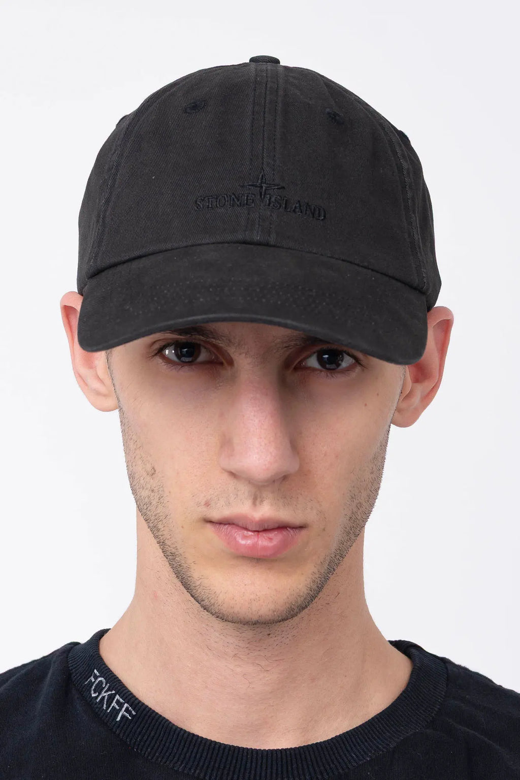 Stone Island, Mens Cap, Baseball Cap, Black V0029, Brushed Cotton Gabardine, Engraved Metal Clip Buckle, Compass Logo, Logo Embroidery, Adjustable Strap, Front Photo on Model. 