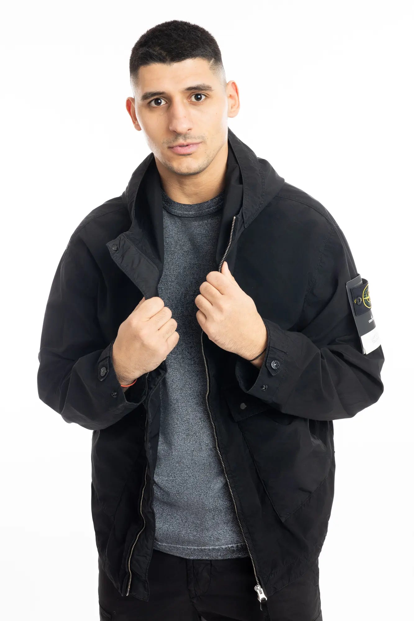 Stone Island, Mens Jacket, Black V0029, Hooded, Two-way zip, Compass Badge, Logo-patch, YKK Zippers, Bellows Pockets, Stone Island Snap Pockets, Adjustable Cuffs, Front View Unzipped. 