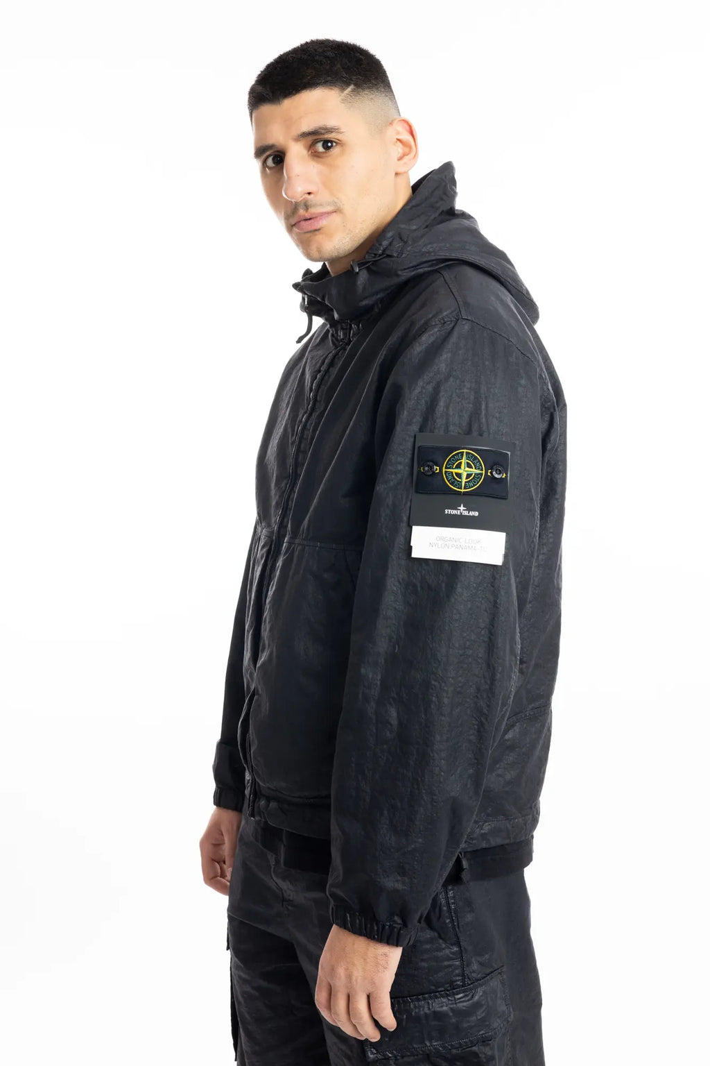 Stone Island, Mens Jacket, Black V0029, Hooded, Drawcord, Elasticated cuffs and hem, Full Zip, YKK Zippers, Compass Badge, Logo-patch, Side Pockets, Side View. 