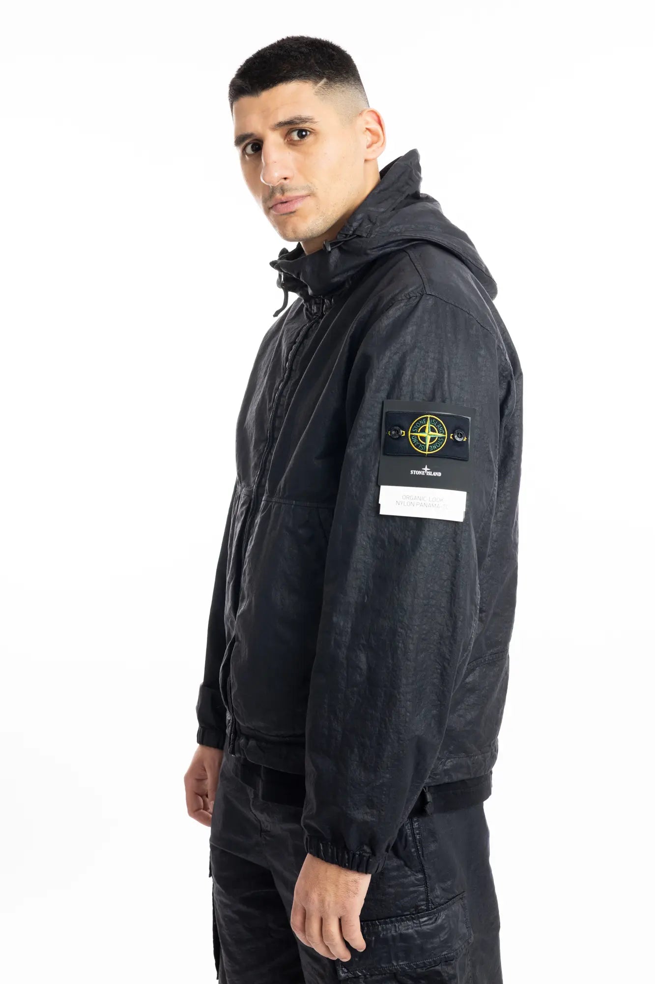 Stone Island, Mens Jacket, Black V0029, Hooded, Drawcord, Elasticated cuffs and hem, Full Zip, YKK Zippers, Compass Badge, Logo-patch, Side Pockets, Side View. 