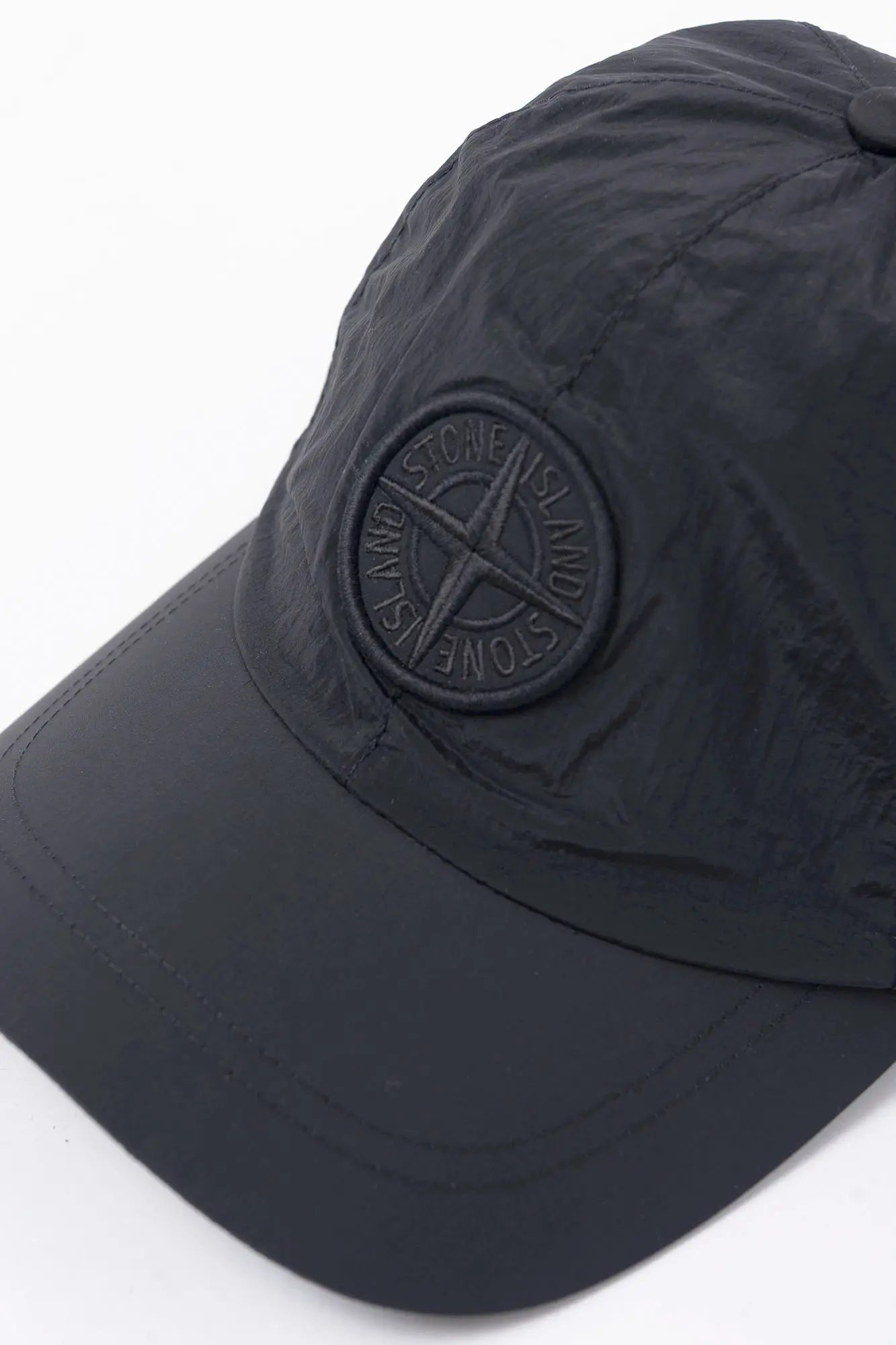 Stone Island, Mens Cap, Black V0029, Nylon Metal, Compass Embroidery, Adjustable Elasticated, Drawcord, Six Panel, Compass Logo, Top-down view. 
