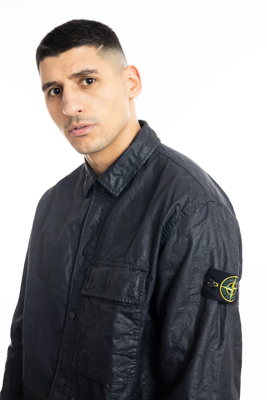 Stone Island, Mens Jacket, Black V0029, Compass Badge, Bellows Pocket, Logo-patch, Stone Island Snaps, Collar, Flap Pocket, Portrait Close-up. 