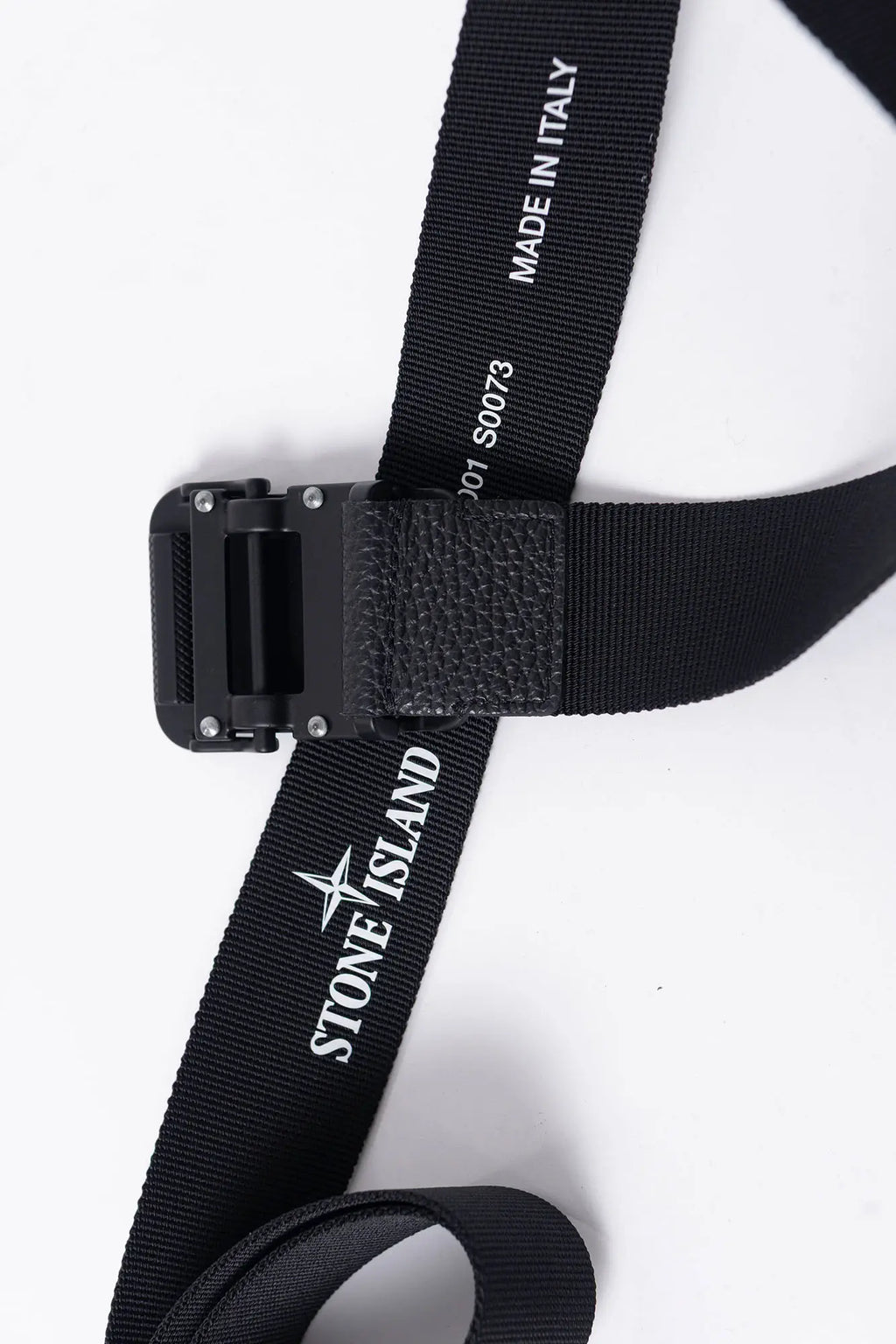 Stone Island, Mens Buckle, Black V0029, Matten Painted, Cowhide Details, Compass Logo, Buckle Showcase Top-Down View.