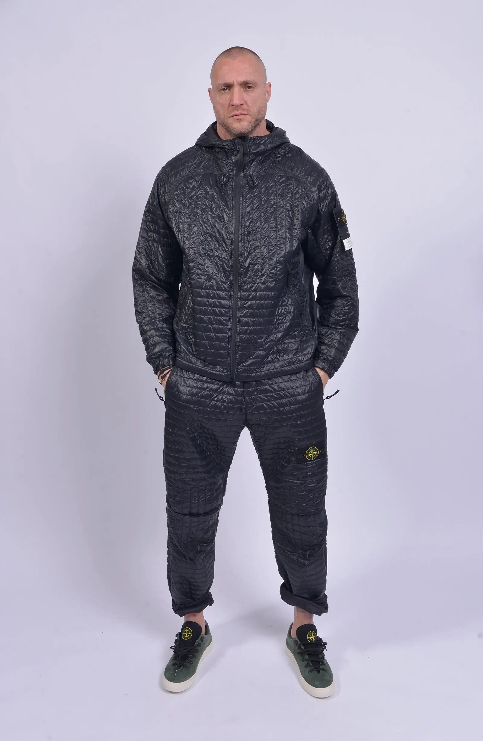 Stone Island, Mens Trousers, Black, Quilted, PrimaLoft Insulated, Stone Island Badge, Compass Badge, Elasticated Waistband, Elasticated Ankles, Side Pockets, YKK Zipper, Recommended fit, Hooded Insulated Jacket, Full Body Front Shot. 