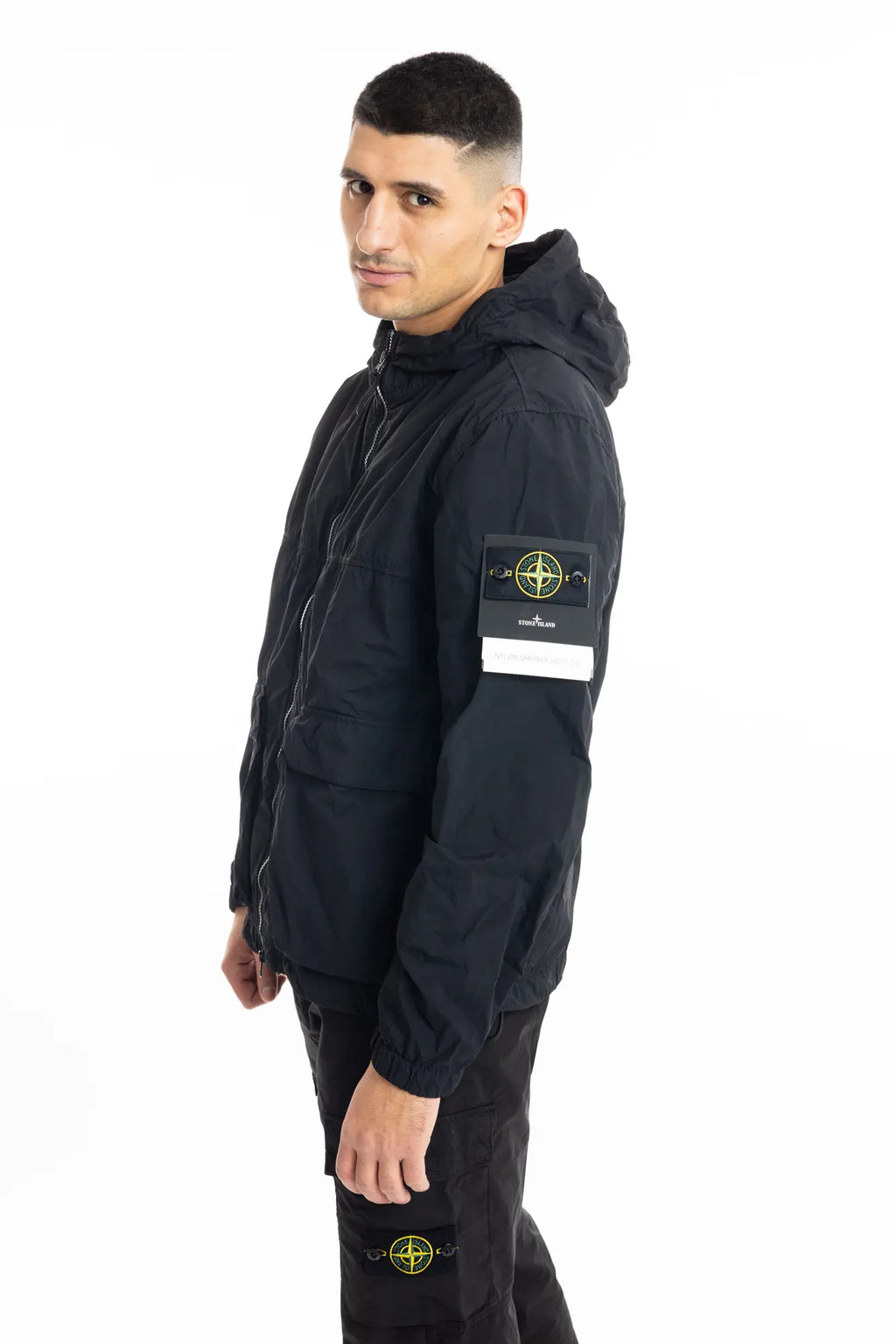 Stone Island, Mens Short Parka Jacket, Black V0029, Full Zip, Compass Badge, Logo-patch, Ykk Zippers, Pockets, Hooded, Drawstring, Elastic Cuffs and Hem, Side View. 