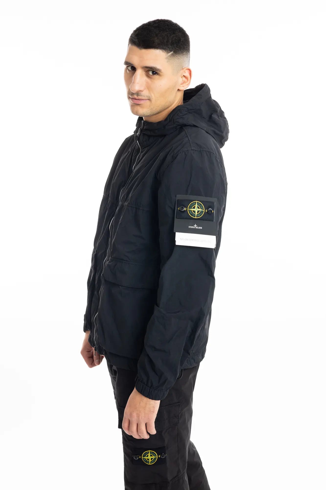 Stone Island, Mens Short Parka Jacket, Black V0029, Full Zip, Compass Badge, Logo-patch, Ykk Zippers, Pockets, Hooded, Drawstring, Elastic Cuffs and Hem, Side View. 