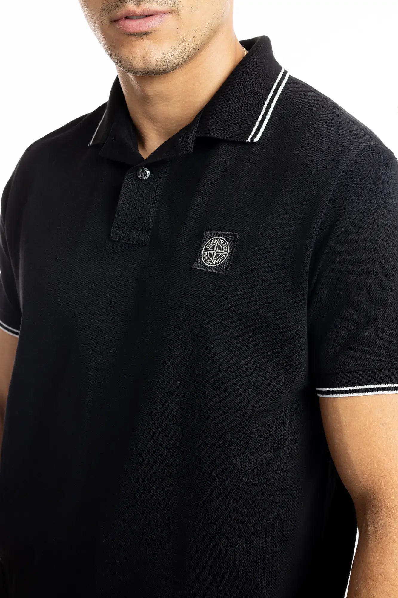 Stone Island, Mens Polo Shirt, Black V0029, Ribbed Collar, Stone Island Buttons, Patch, Ribbed Cuffs and Hems, Elastic Piqué, Patch Close-up. 