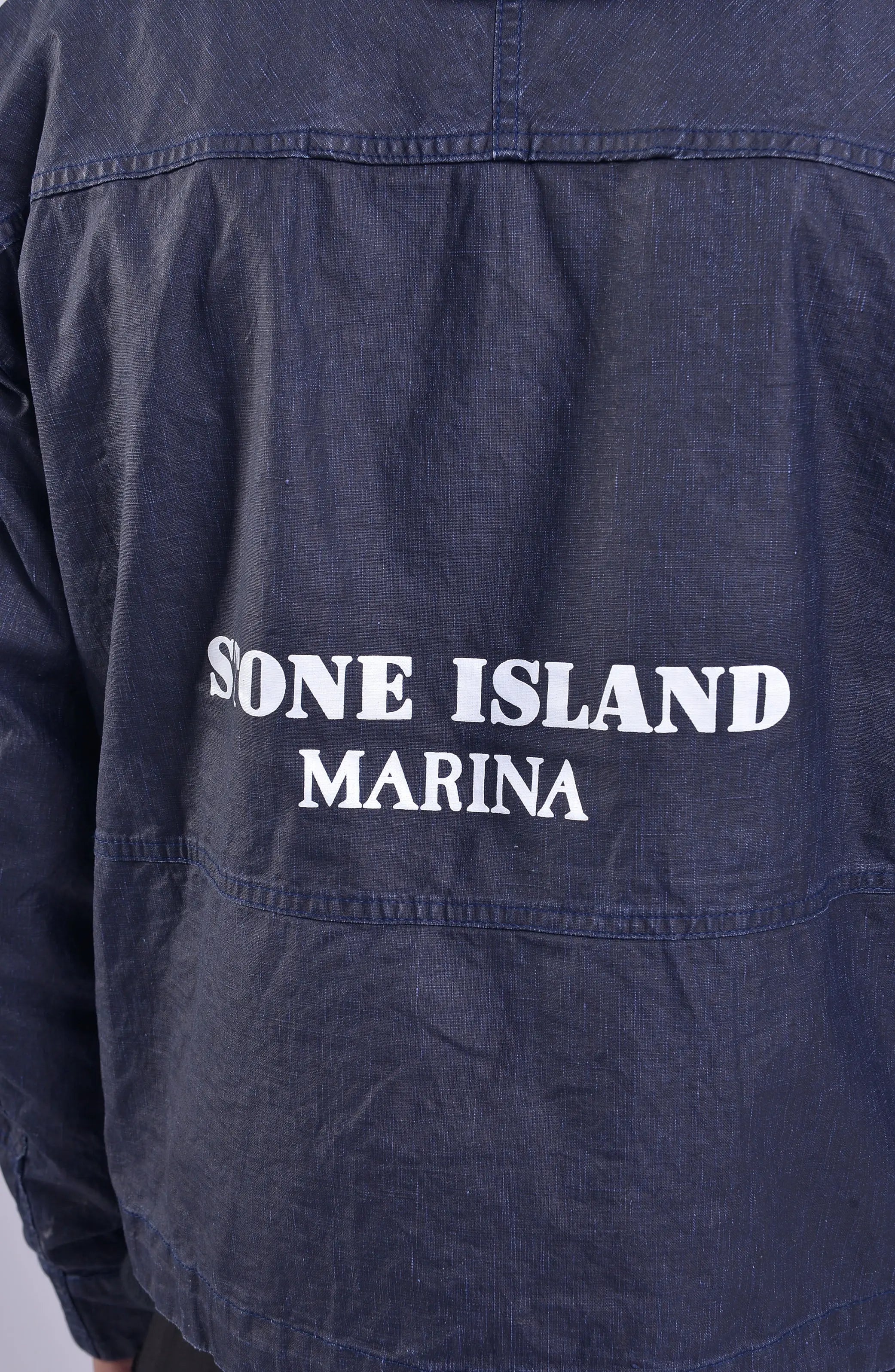 Stone Island, Mens Blouson, Royal Blue (V0027), Resin Coated, Non-toxic, Stone Island Buttons, YKK Zipper, Water repellent, Side Pockets, Stone Island Marina Back Print Close-up Photo. 