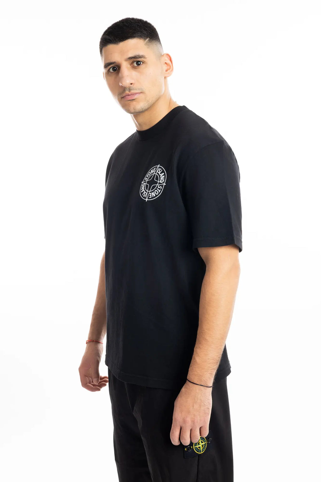 Stone Island, Mens T-Shirt, Black V0029, Raised Print, Front and Back Print, Cotton Jersey, Crewneck, Compass Logo, 'Outline Compass' print, White Print, Black Cotton, 100% Cotton, 3/4 Front View. 
