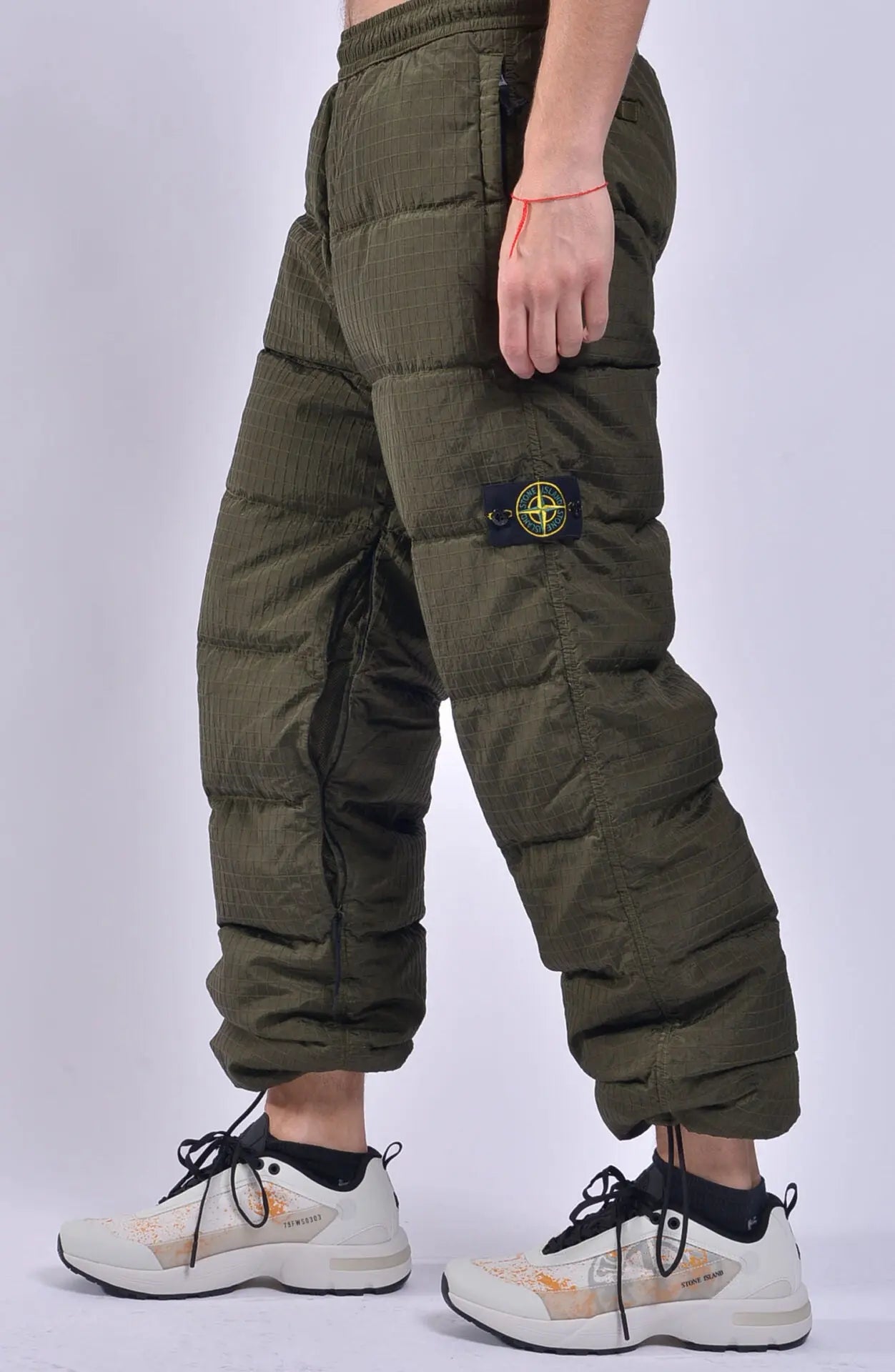 Stone Island, Mens Pants, Down Filled, Olive Green, Ripstop Down Filled trousers, Stone Island Badge, YKK Zipper, Side Photo. 